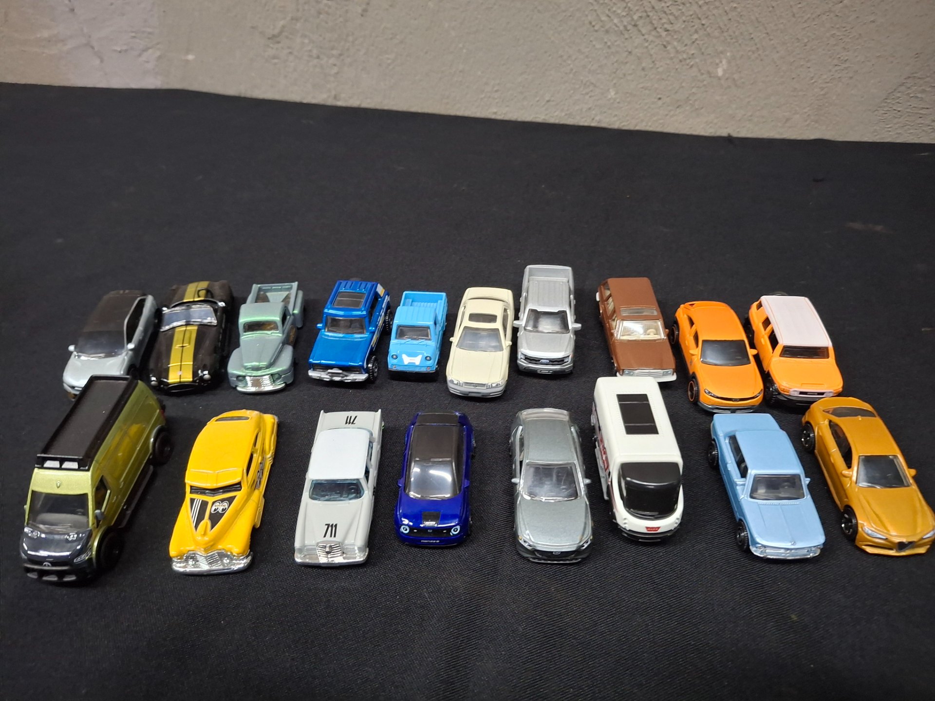 Bulk lot — 18 Hot Wheels / Mattel die-cast toy cars, mixed models, used playwear