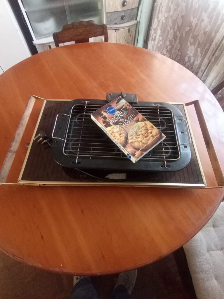 Electric tabletop grill with cooking rack — working grill, hot plate with missing power cord, cookbook included