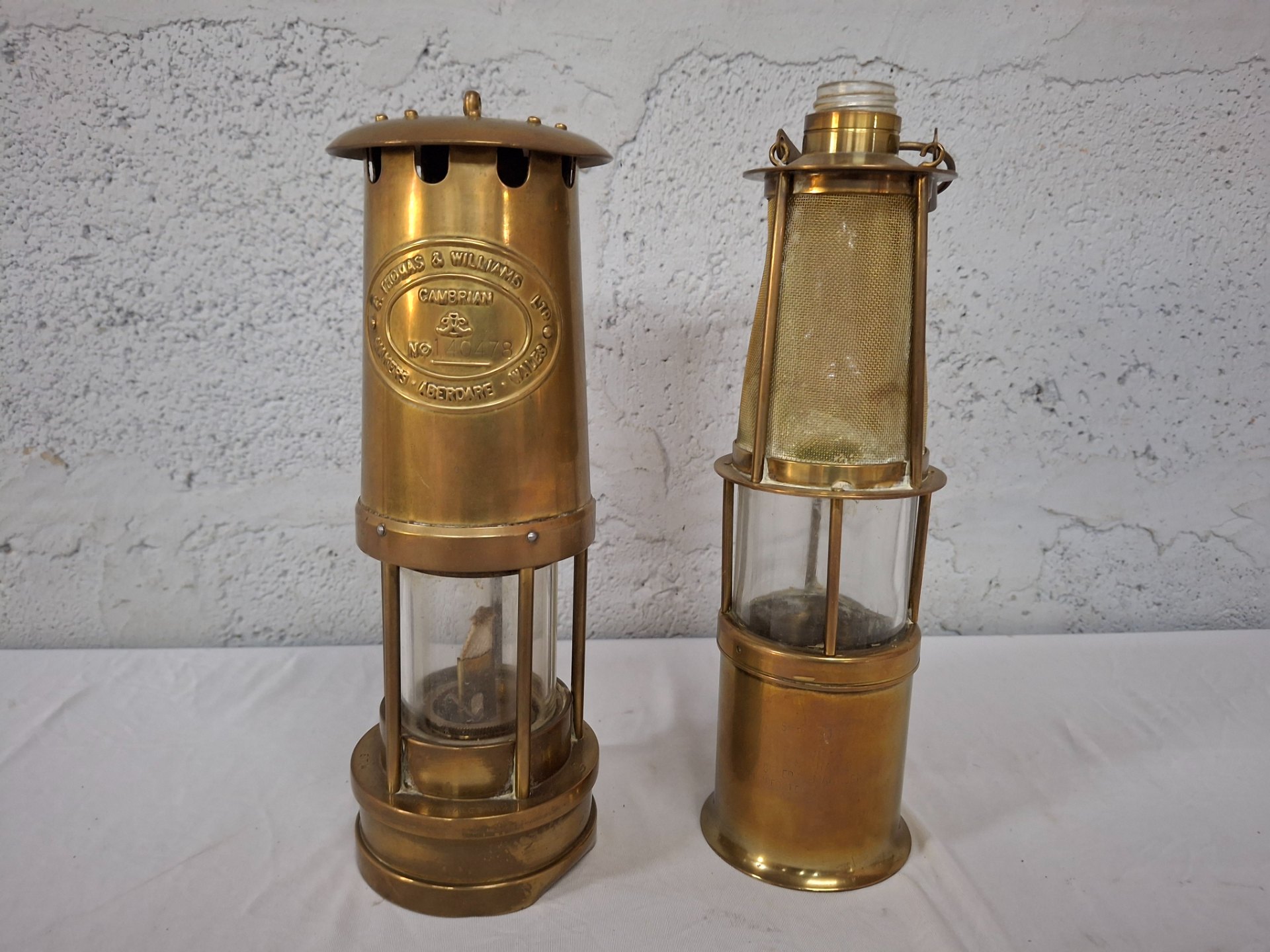 Pair of Brass Miner’s Safety Lamps — E. Thomas & Williams (Cambrian) marked — Decorative pair