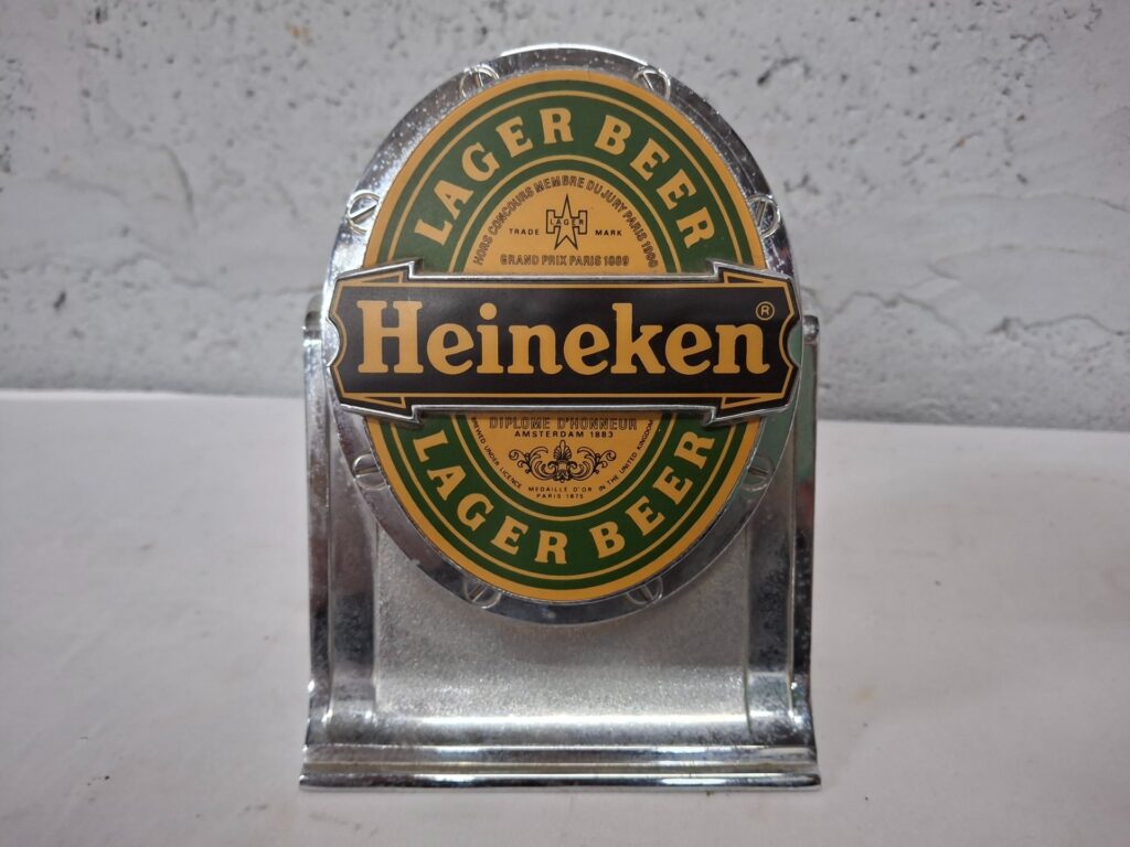 Heineken branded tabletop halogen spotlight — chrome finish, heavy pitting, power cable cut (Not working)