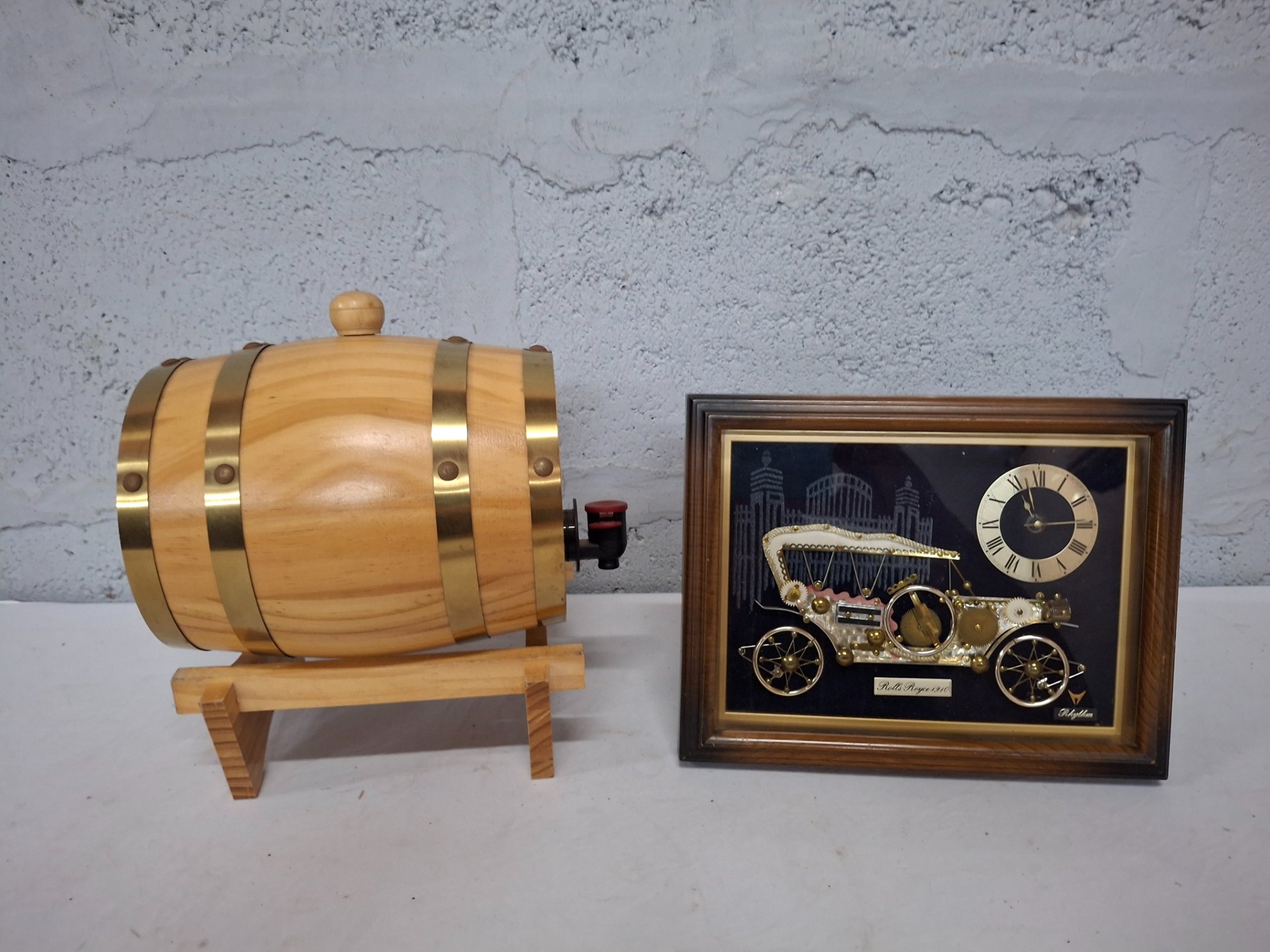 Decorative Wooden Barrel on Stand with Brass Bands + Framed Rhythm ‘Rolls Royce 1910’ Novelty Clock (2 items, clock not working)