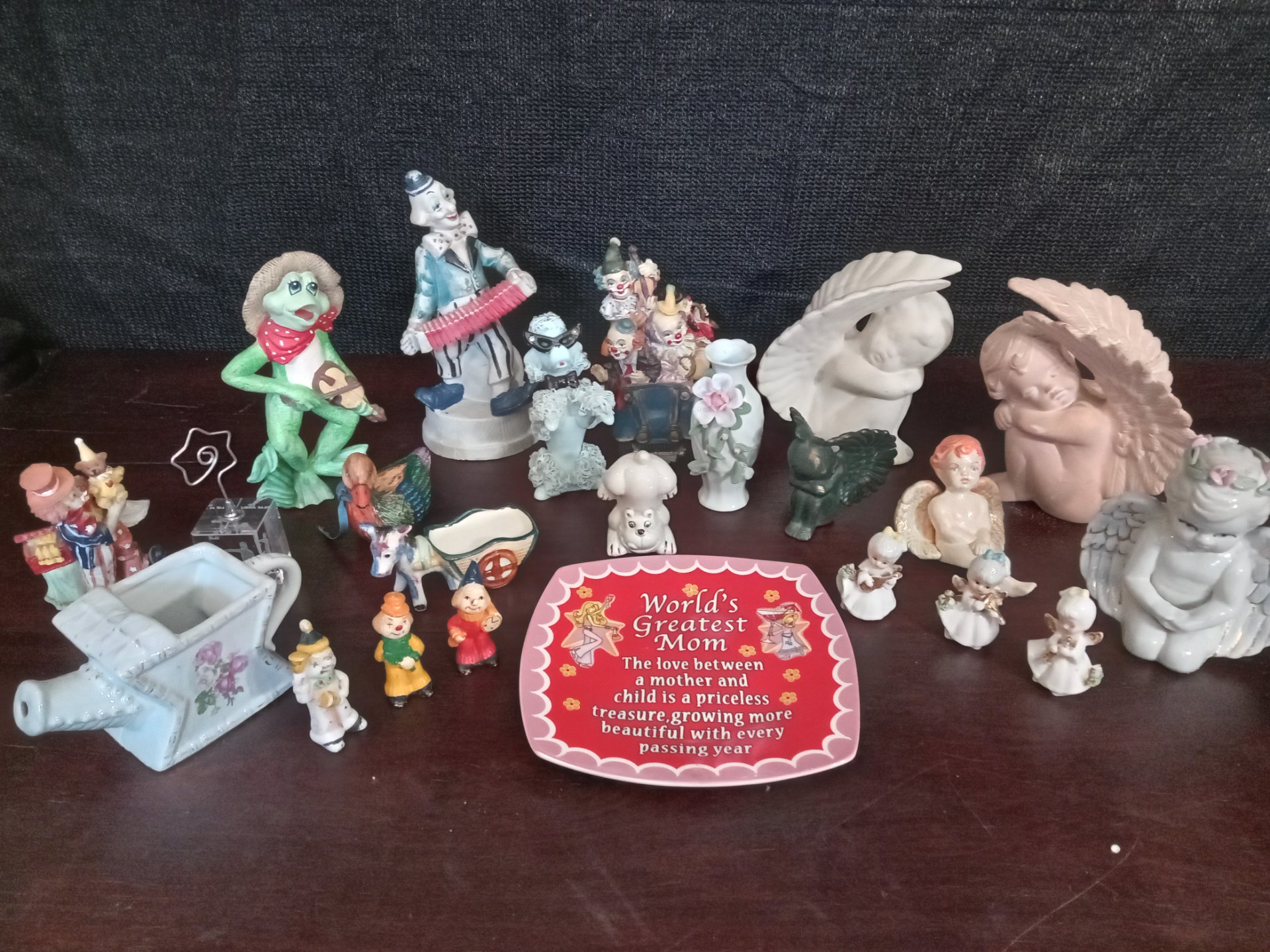 Mixed lot approx 23 small porcelain & ceramic figurines — angels, clowns, novelty pieces, small vases and a glass Libra block (sold as one lot)