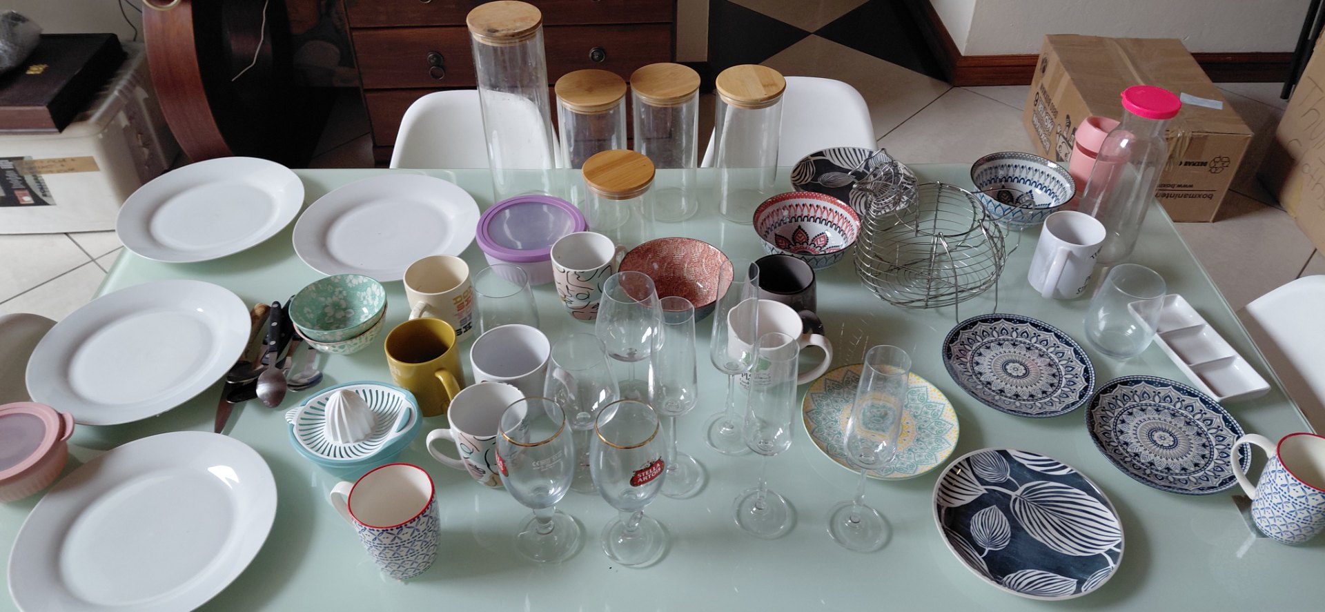 Lot 03 — Assorted Kitchen & Diningware: plates, mugs, stem glasses, bowls, 4 glass storage jars (mixed lot)