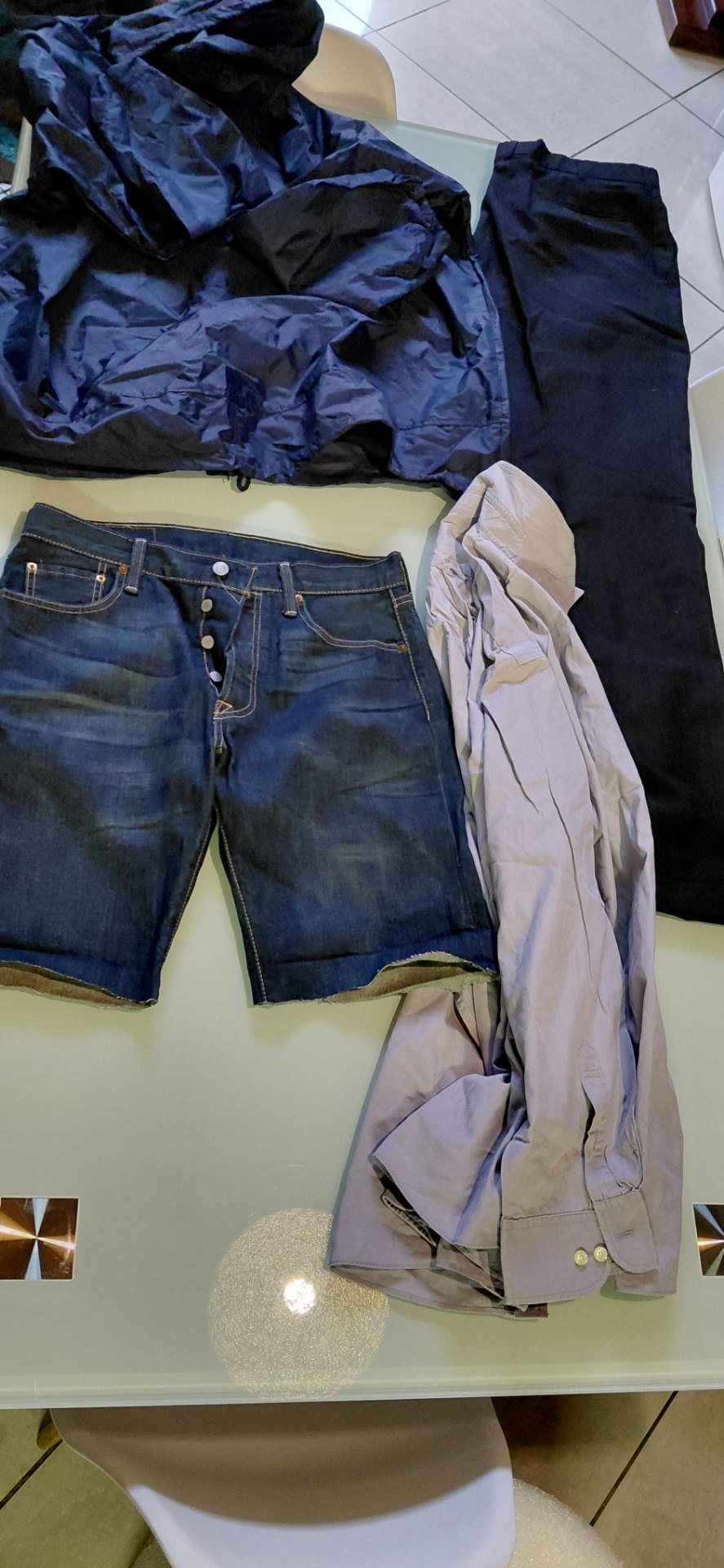 Lot 09 — Mixed Men’s Clothing: Navy Windbreaker (XL), Levi’s 501 W30 (cut to shorts), Formal Trousers & Light Purple Shirt
