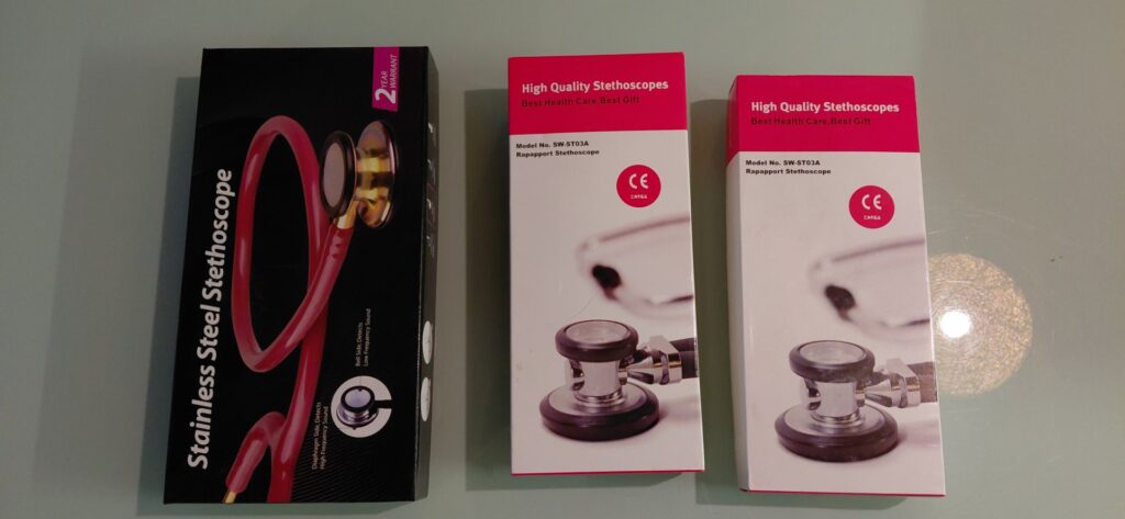 Lot 18 — 3 x Acoustic Stethoscopes (New, opened) — 2 x SW-ST03A (red boxes) + 1 Stainless Steel (black box)