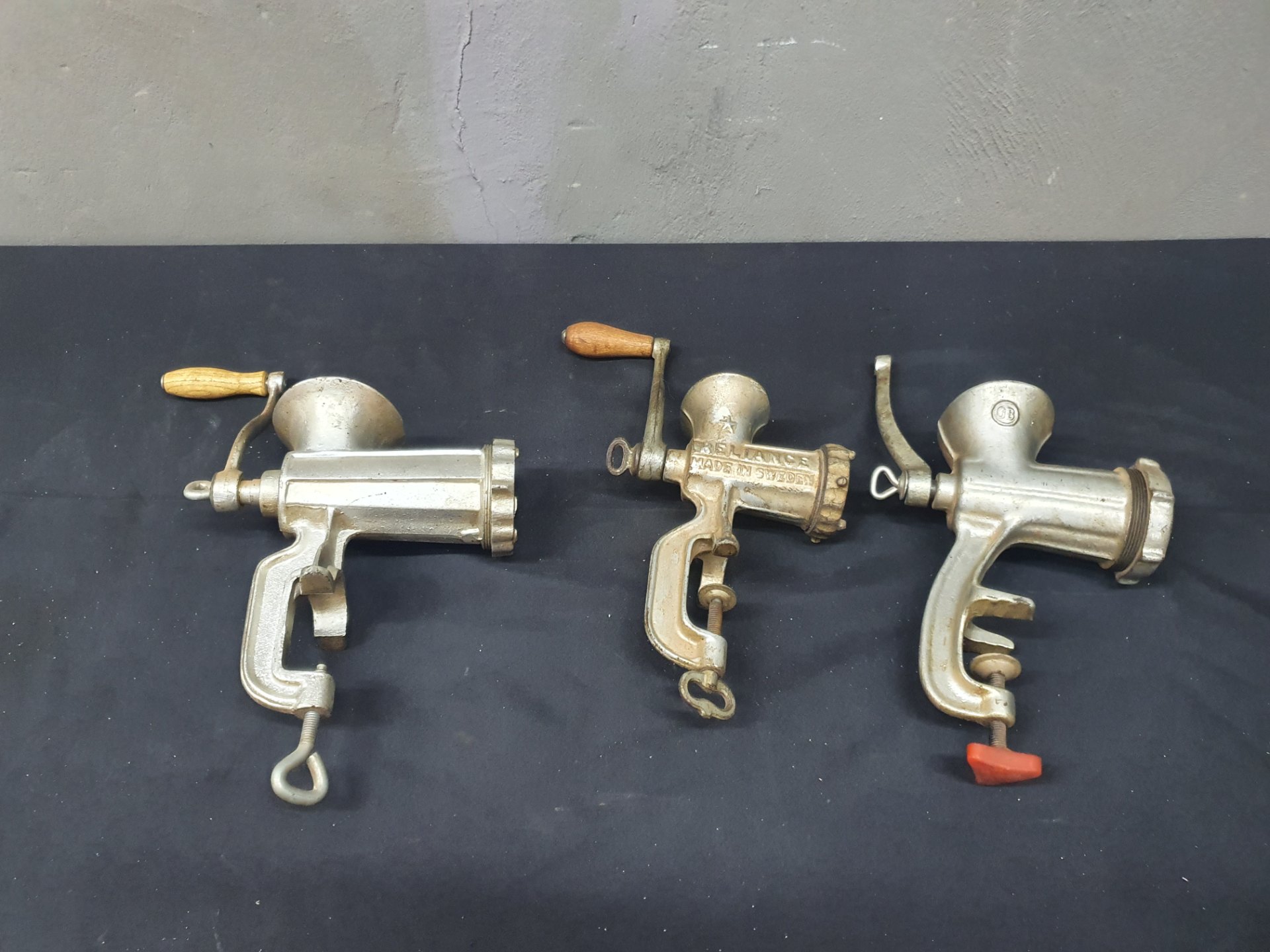 Lot of 3 Vintage Clamp‑On Manual Meat Grinders — Cast Metal (one stamped ‘RELIANCE MADE IN SWEDEN’)