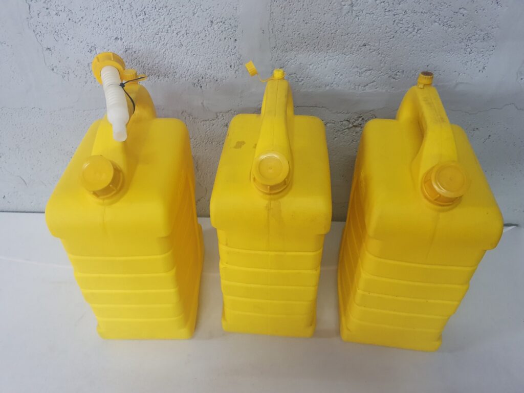 Lot of 3 Yellow 15L Diesel Cans — caps present, one flexible pour spout