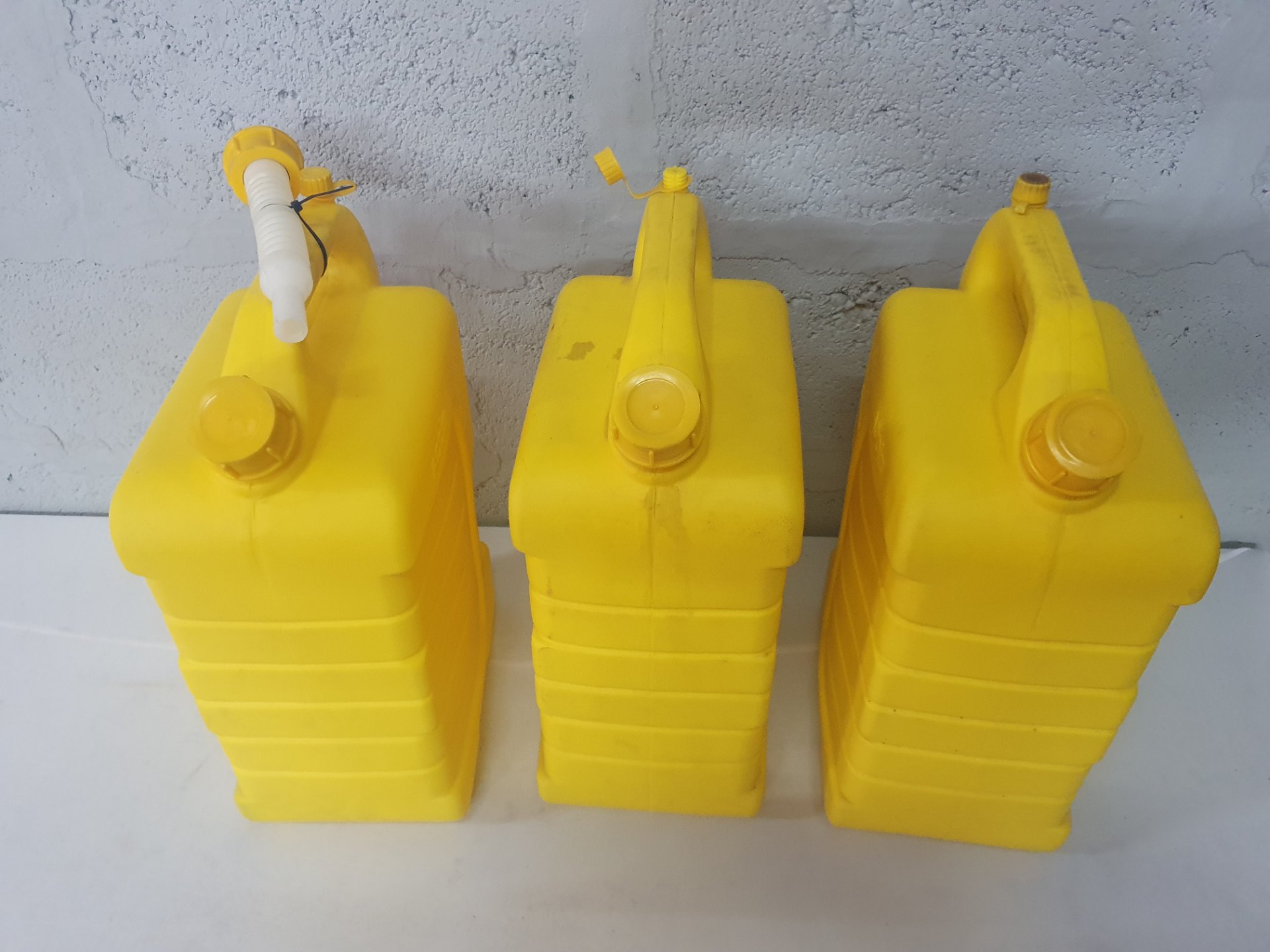 Lot of 3 Yellow 15L Diesel Cans — caps present, one flexible pour spout