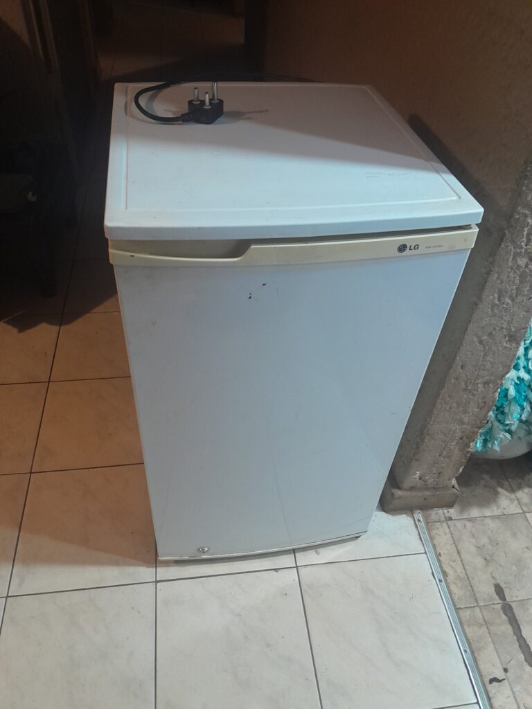 LG compact upright fridge / top-freezer (logo visible) — tested working, shelving & crispers included