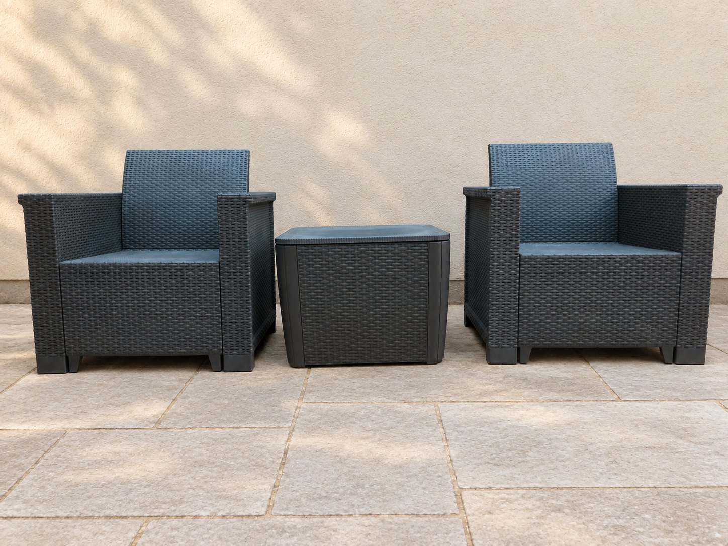 Outdoor rattan-effect resin patio set — 2 armchairs + storage cube/side table (dark grey)