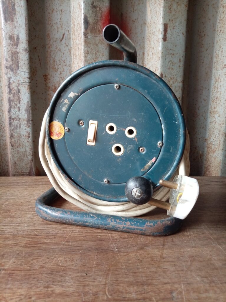 Used Metal Cable Reel with 3-Socket Faceplate and On/Off Switch — Tested Working, Rewinds Freely