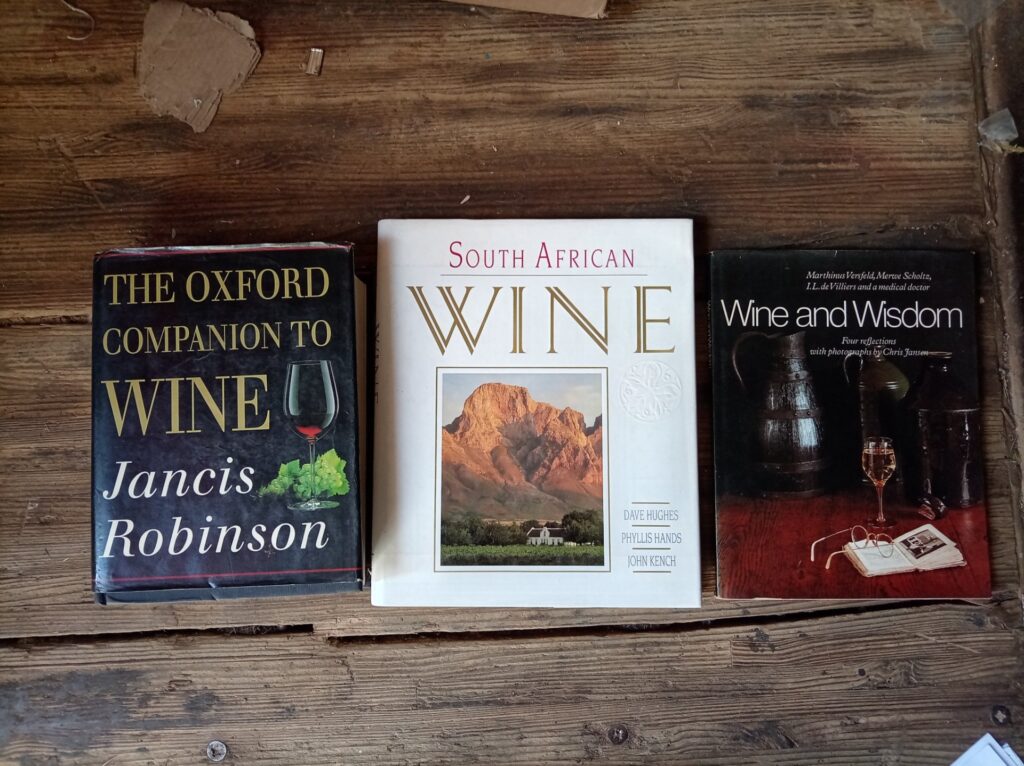 Three hardback wine books — The Oxford Companion to Wine; South African Wine; Wine and Wisdom (dust jackets present, worn)