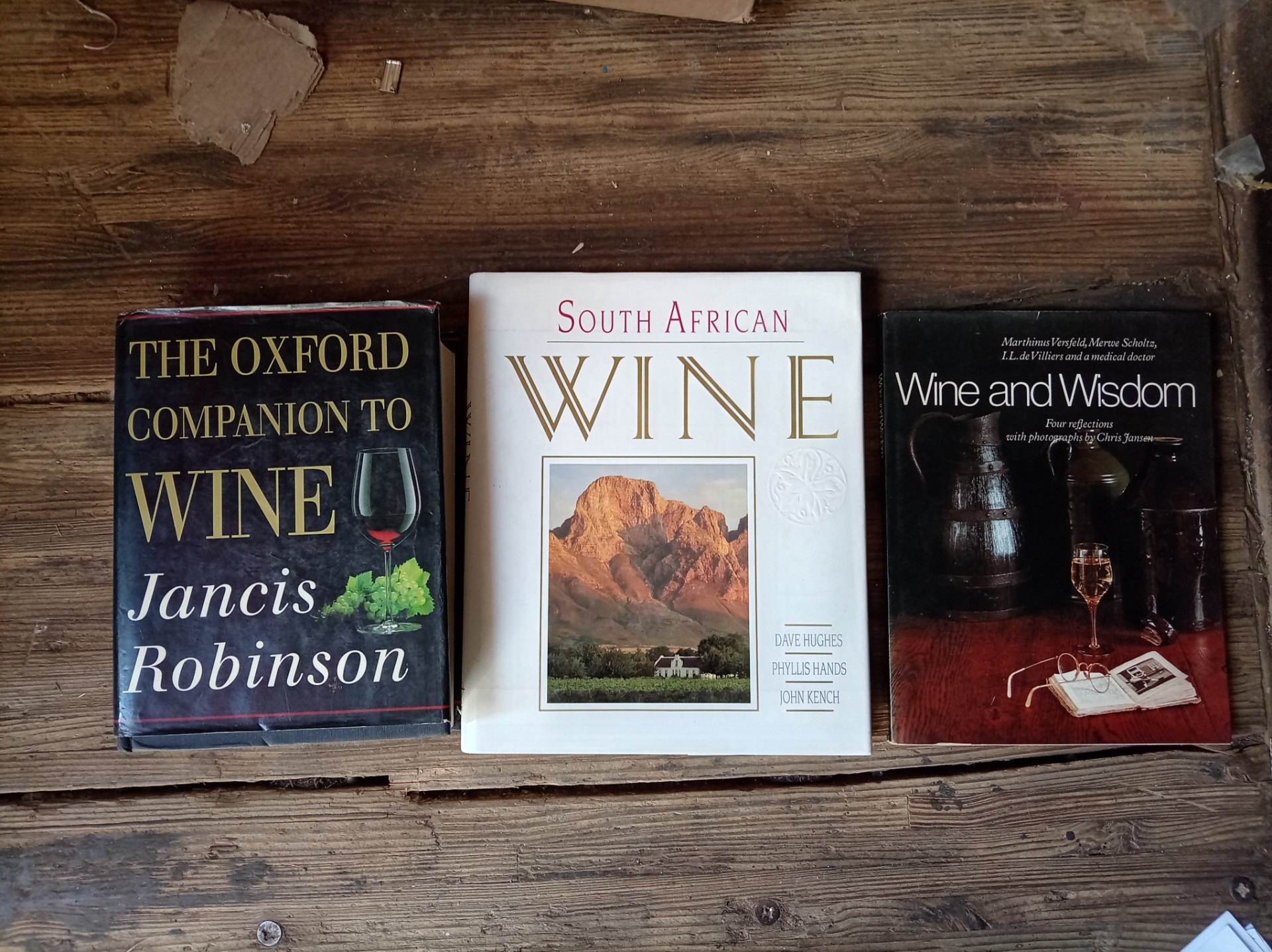 Three hardback wine books — The Oxford Companion to Wine; South African Wine; Wine and Wisdom (dust jackets present, worn)