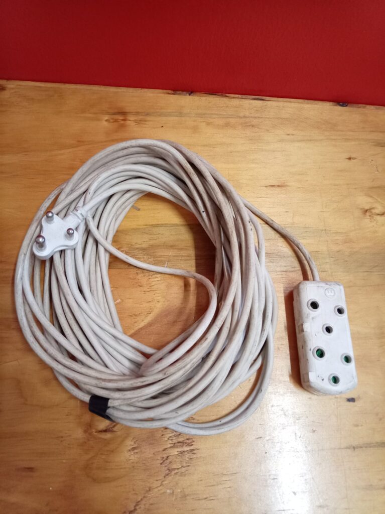 Very long white multi-socket extension lead — 3‑pin plug to 5‑way socket block