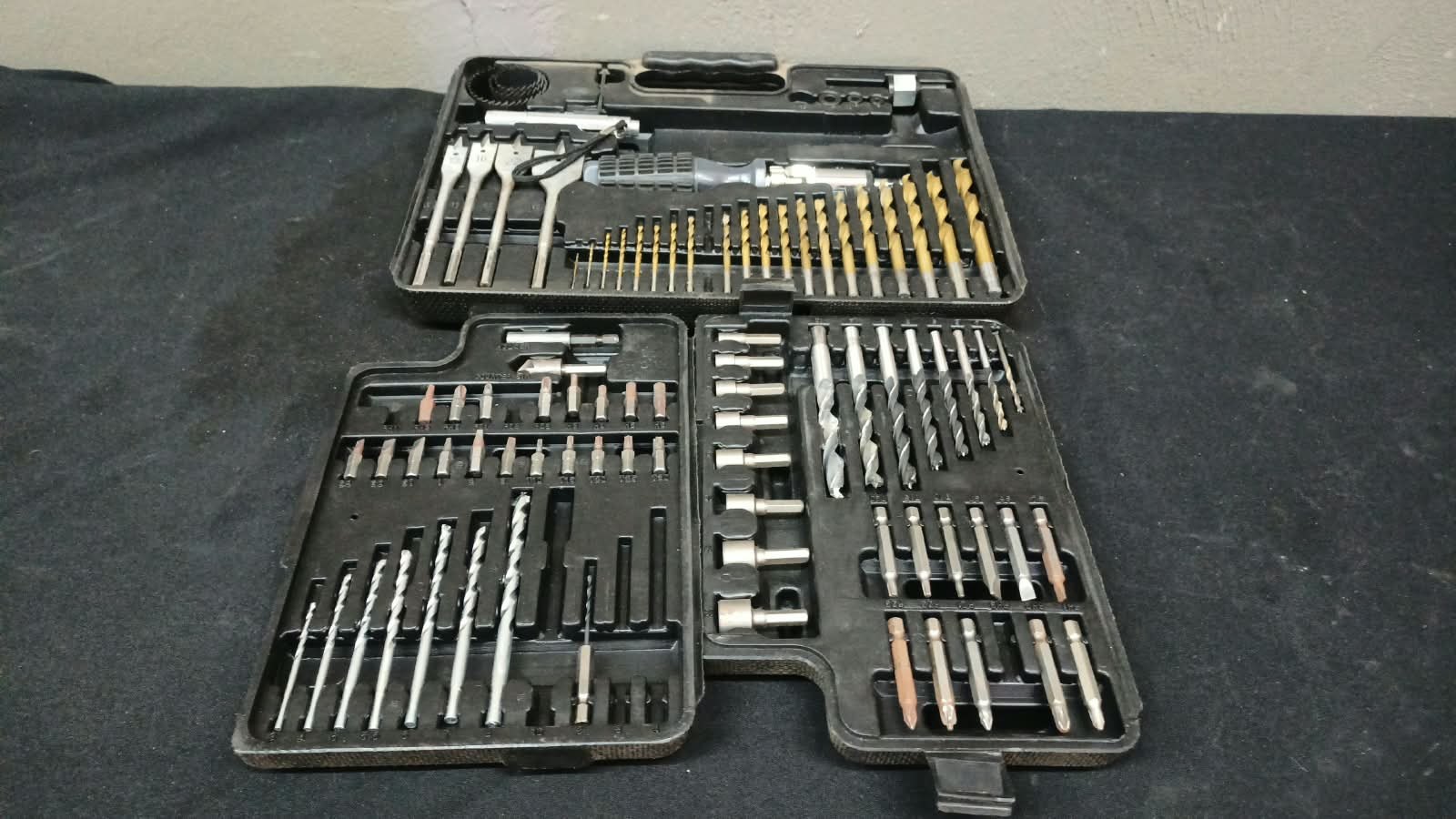 63-piece Assorted Drill, Driver & Spade Bit Set in Plastic Case — Used, Surface Rust, Case Damaged