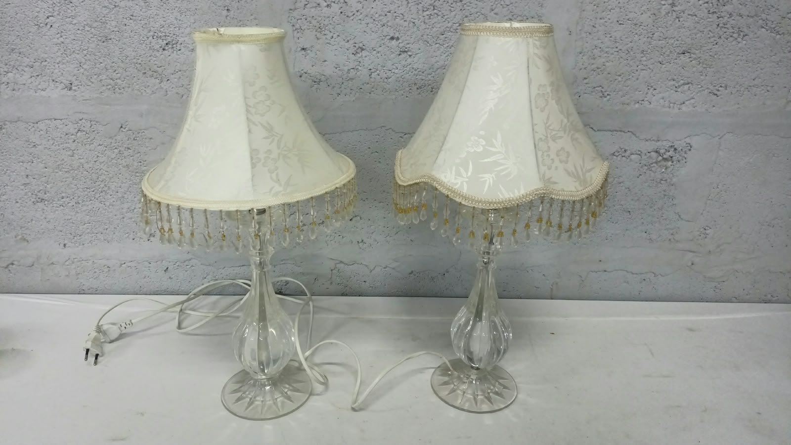 Pair of glass table / bedside lamps with fabric shades and beaded fringe