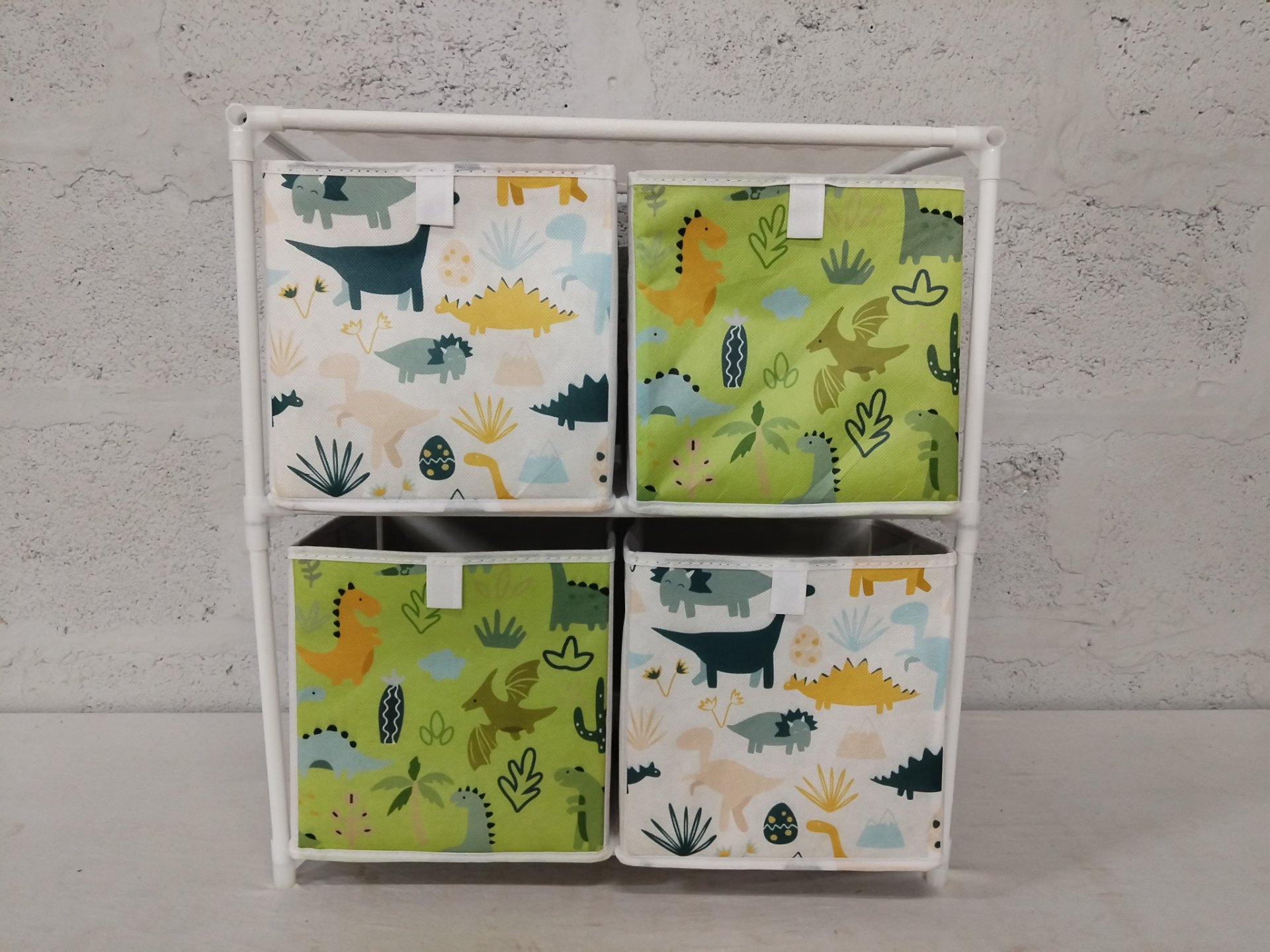 Children’s 4‑Bin Fabric Storage Organiser — White Tubular Frame, Dinosaur Print, 53 x 31 x 58 cm (dent to top tube)