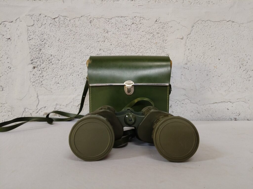 Green military-style binoculars with shoulder case — Japan-marked, lens caps & blue-coated optics