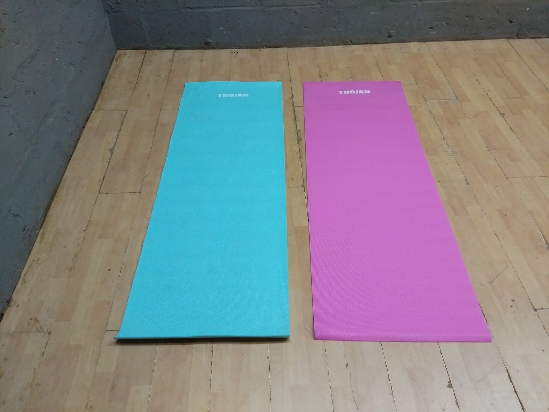 Pair of TROJAN textured yoga / exercise mats — turquoise + pink
