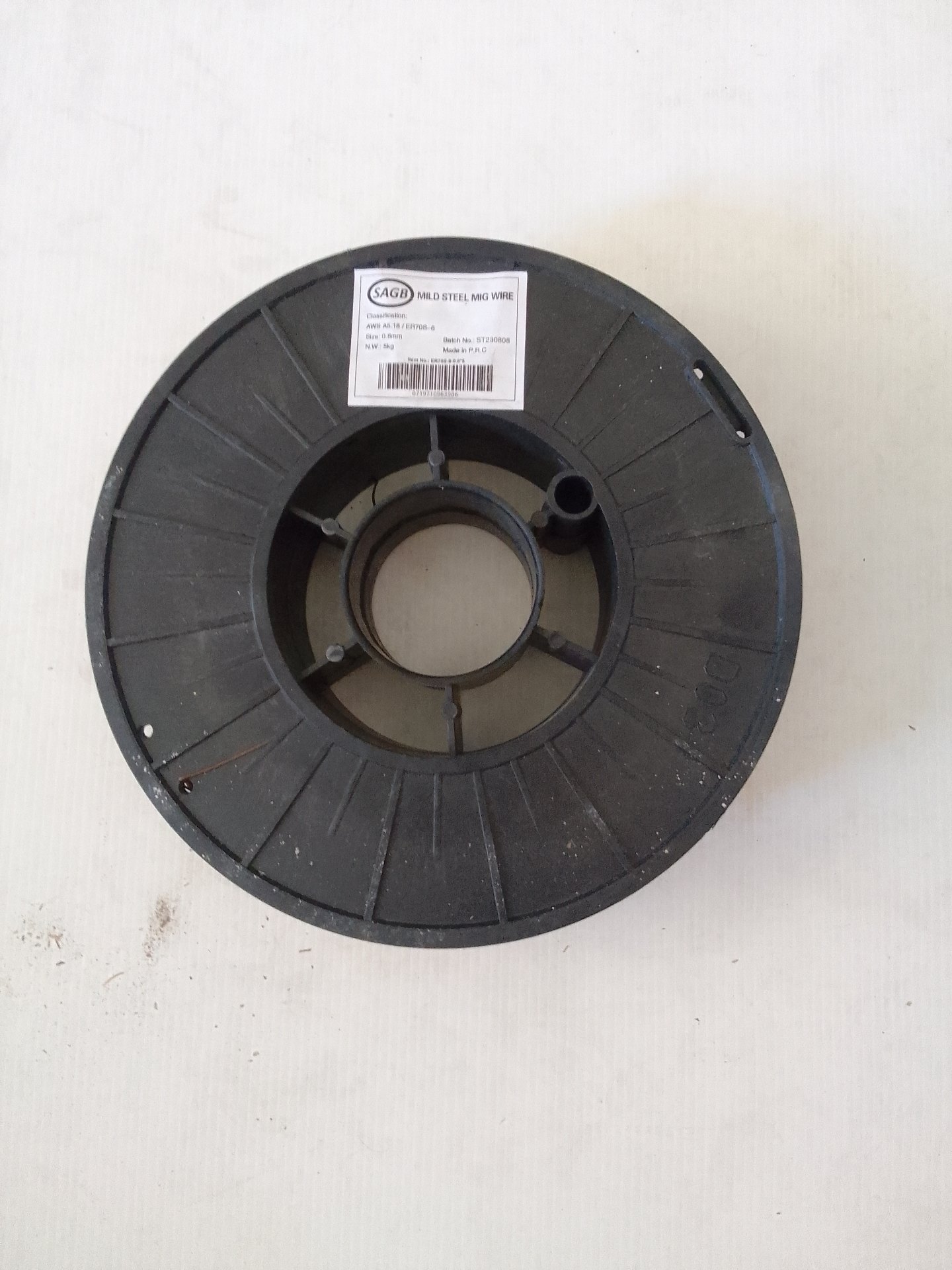 SAGB Mild Steel MIG Wire — ER70S-6 0.8 mm, 5 kg full roll (labelled) on plastic spool — new wire, spool shows wear