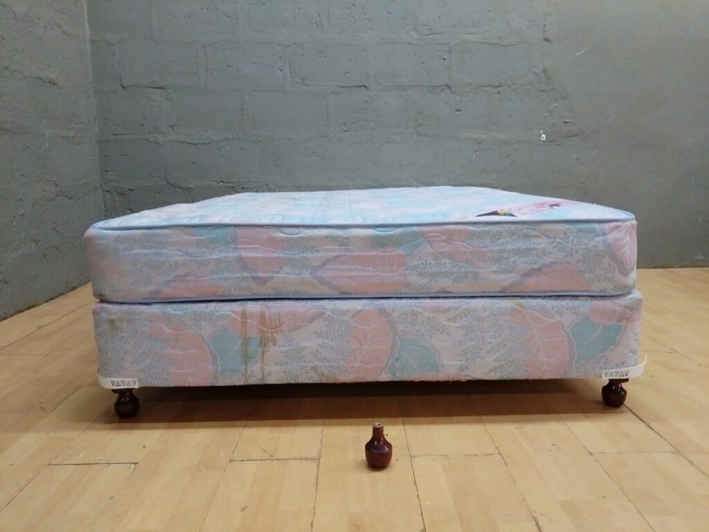 Candice Supreme mattress + divan base 136 x 188 x 50 cm — labelled, heavy staining, one foot detached (sold together)