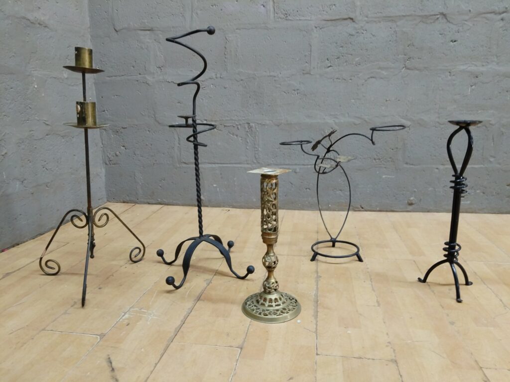 Lot of 5 Assorted Metal / Wrought‑Iron Candlesticks — Mixed decorative holders, used