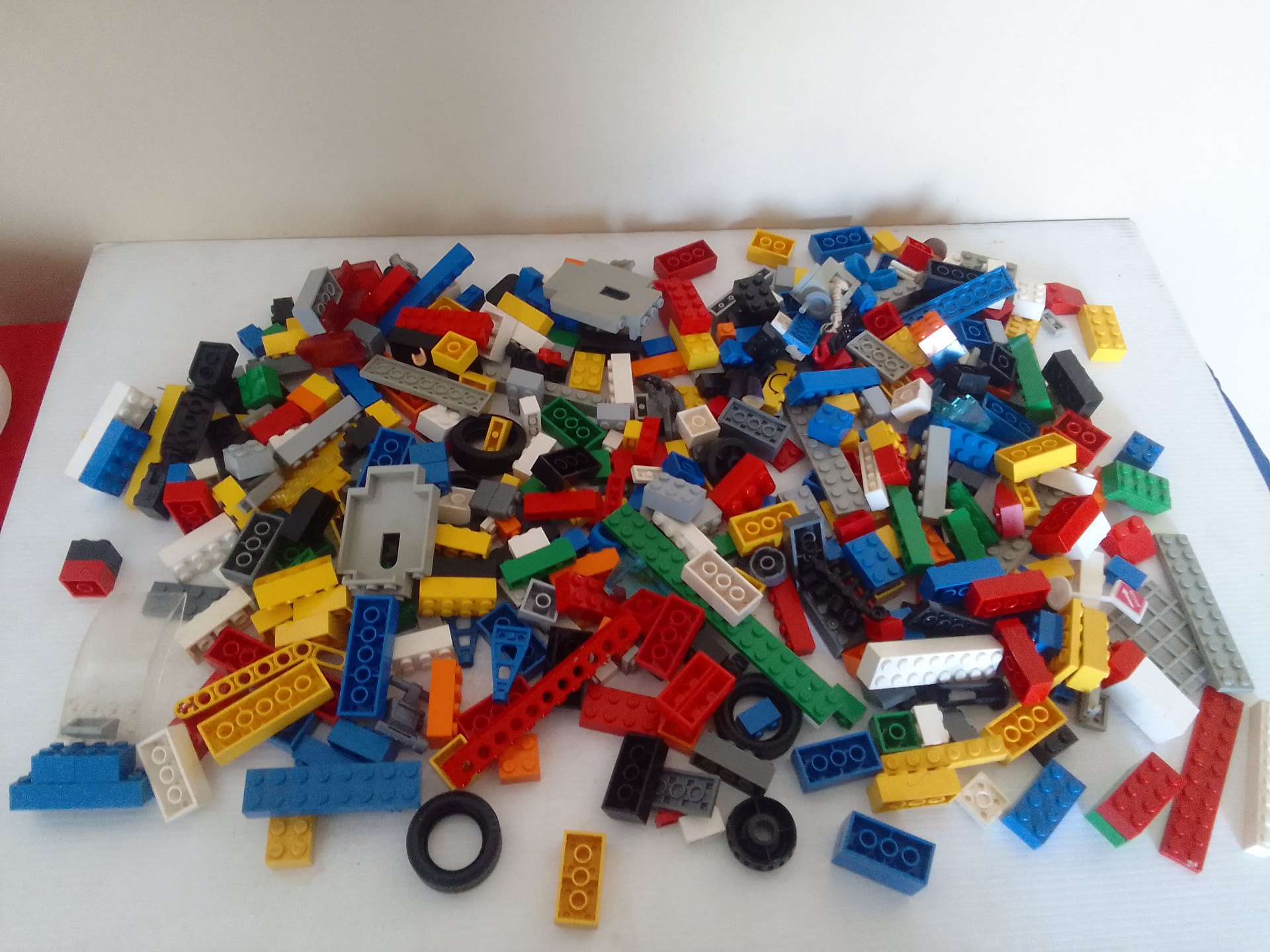 Large lot of LEGO bricks & parts – mixed used plates, wheels, tyres and technic elements