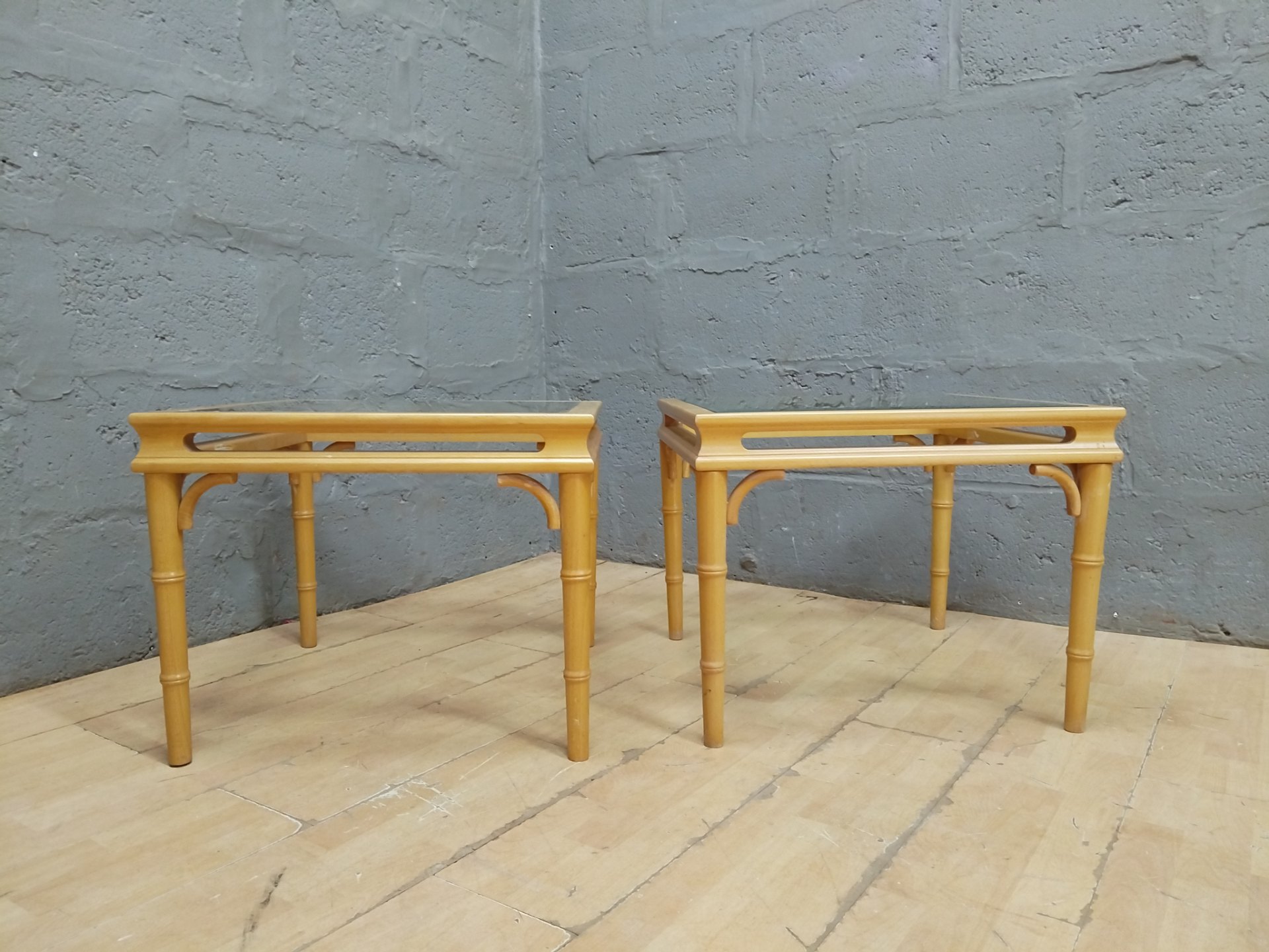 Pair of square glass‑top side tables (60 x 60cm, 48cm high) — light wood frames, removable glass