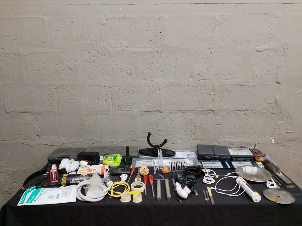 Mixed lot ~50 small tools, chargers, LED bulbs, bits, multimeter & car stereo — used, for parts/repair