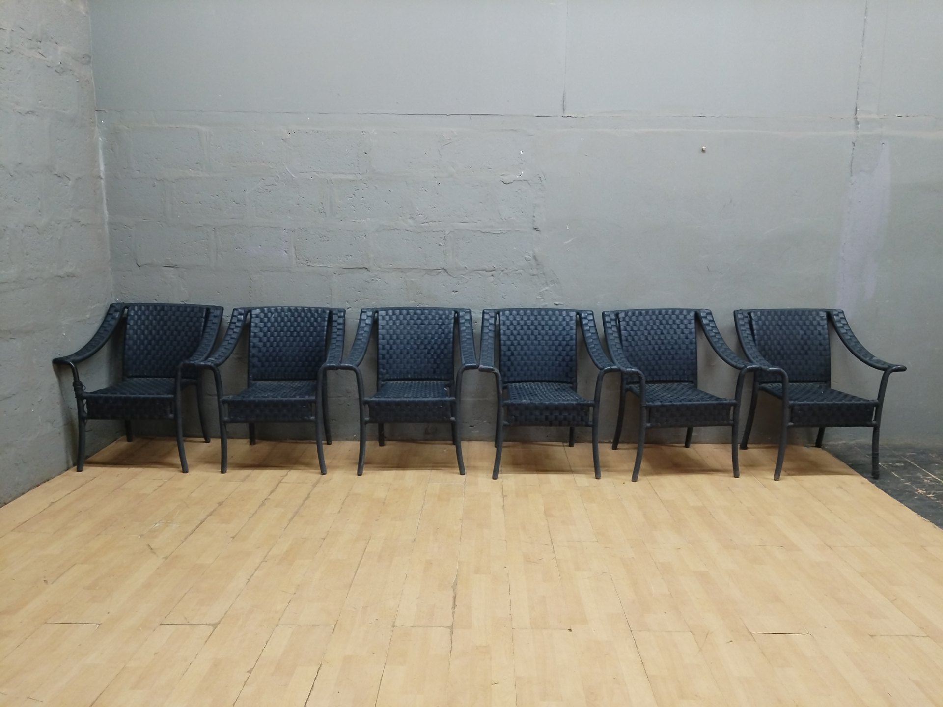 Set of 6 Black Woven Natural-Rattan Armchairs on Tubular Metal Frames – Worn, Repairs