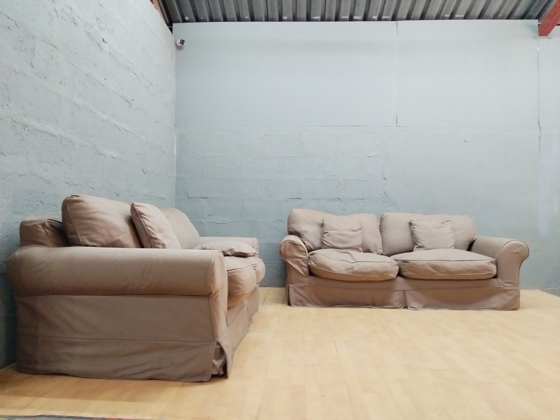 2-piece upholstered sofa set — 1 x 2-seater + 1 x armchair, removable covers, visible tear & staining (used)