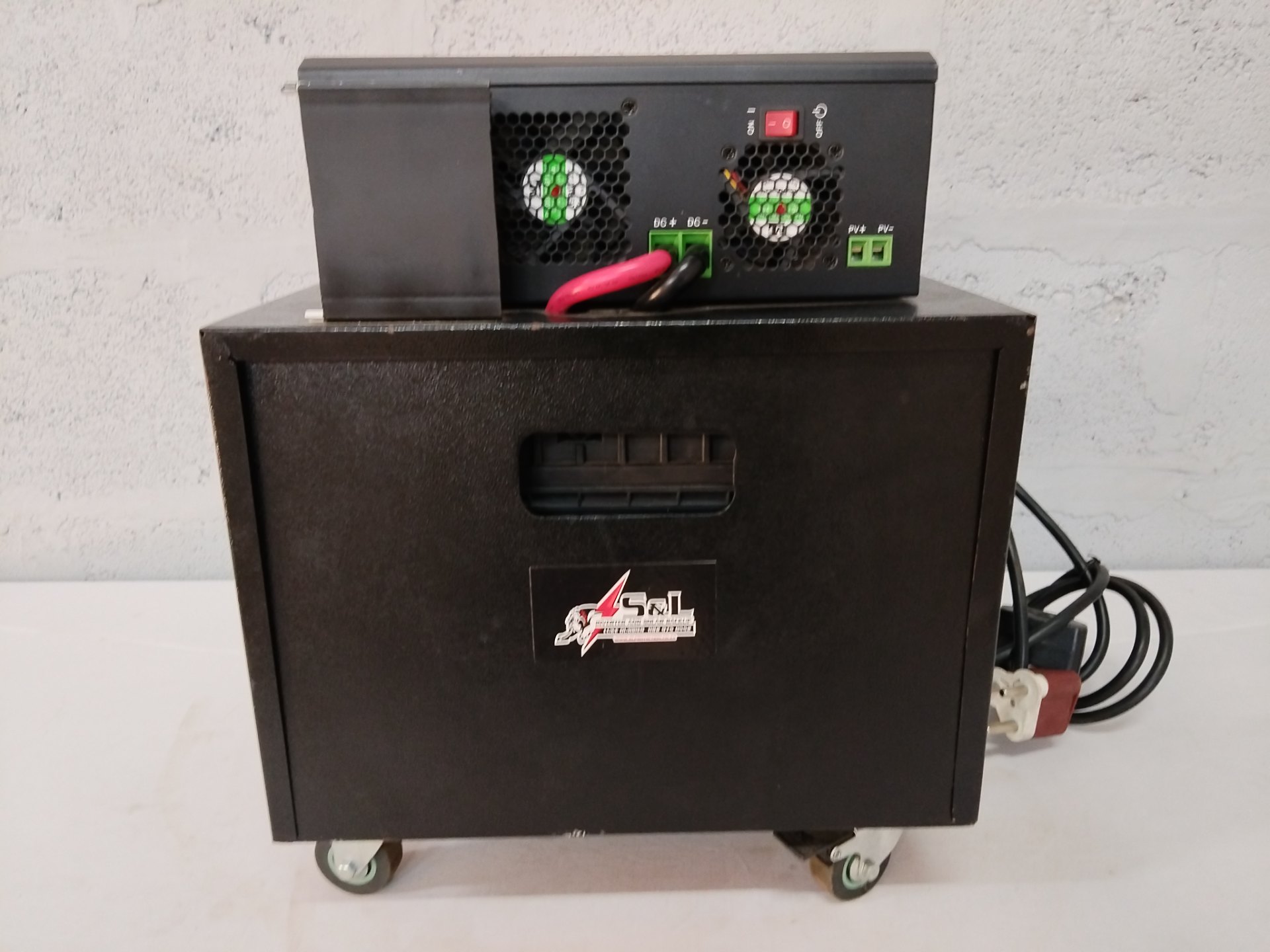 Solfar SAPPHIRE HYBRID 3024P Hybrid Solar Inverter — unit (not working) with external battery visible