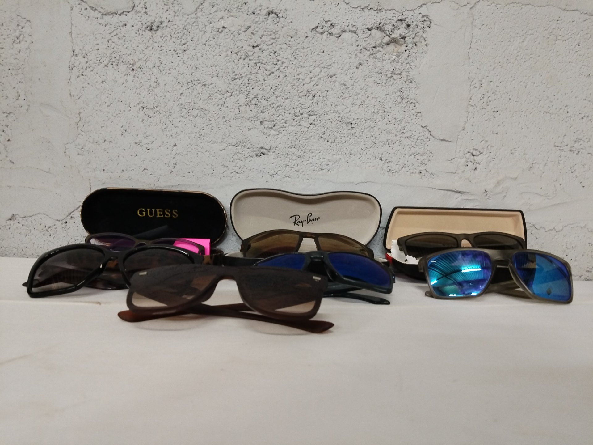 Lot of 7 Mixed Sunglasses — Assorted Styles with Some Branded Hard Cases (Ray-Ban, Guess) — Used, Surface Scratches