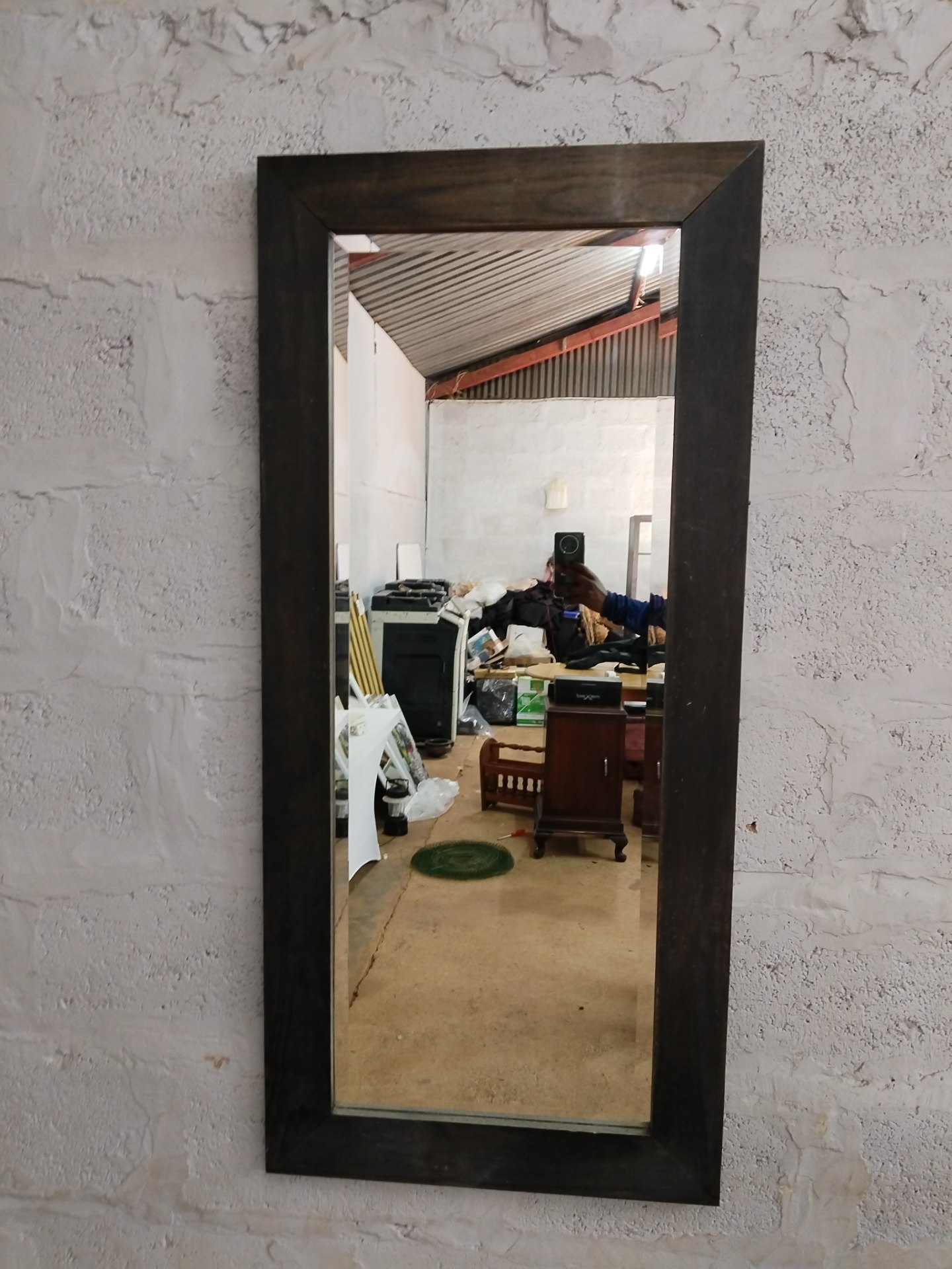 Full-length wall mirror with dark stained wooden frame — 63 x 138 cm