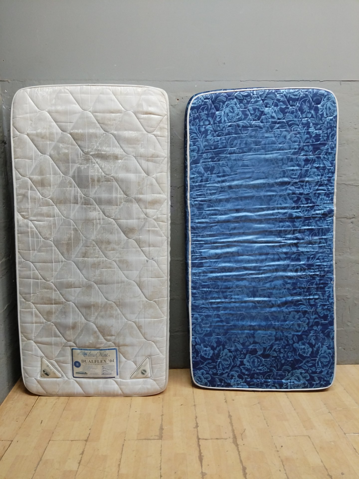 Lot: 2 x Single Mattresses — Cloud Nine label on one, heavy staining & tear (190 x 90 x 18cm)