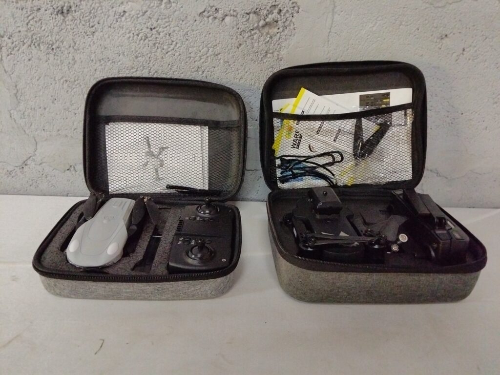 Two Foldable Drone Kits in Fitted Travel Cases (white ‘G7’ + black) — Tested Working