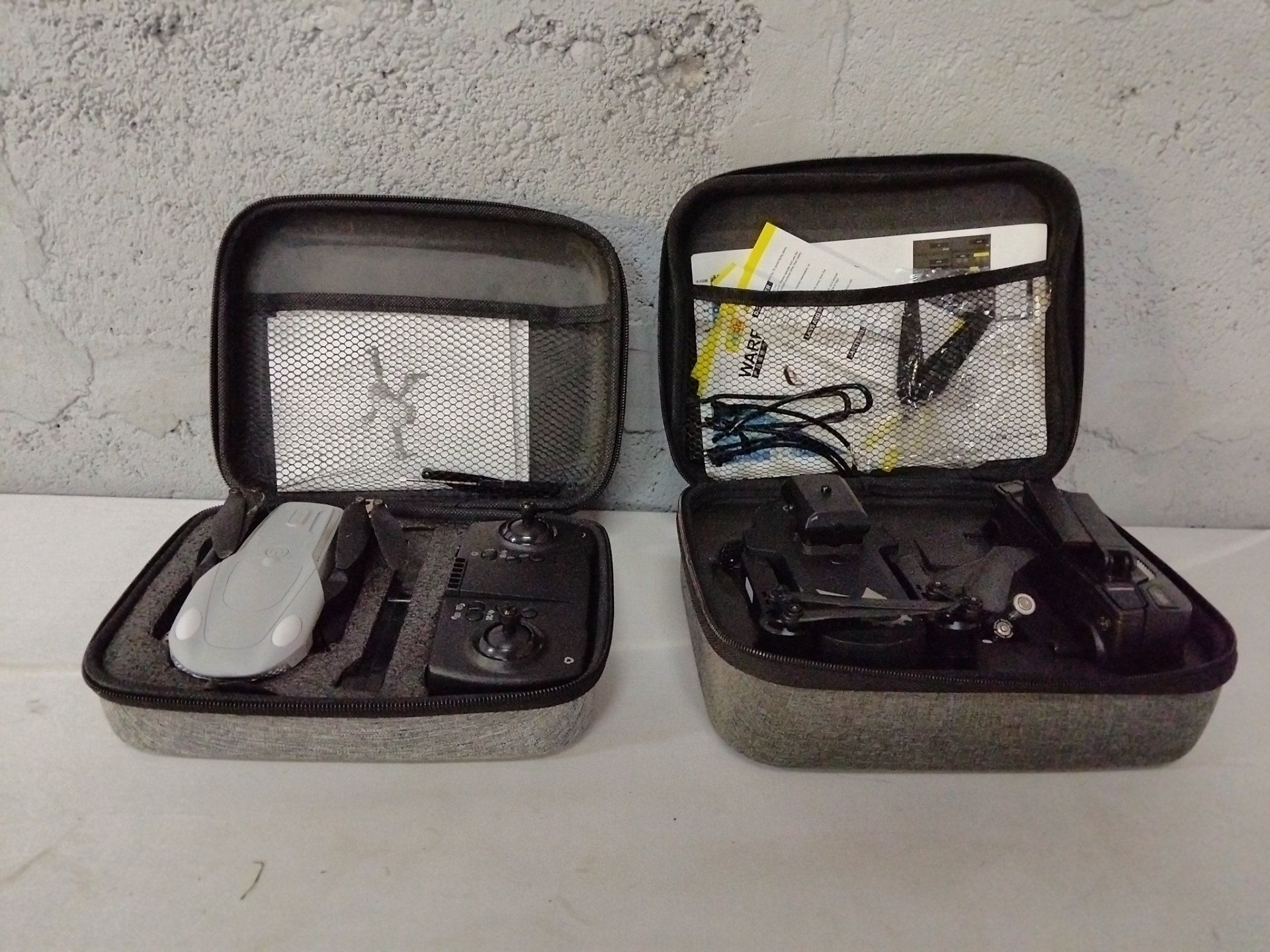 Two Foldable Drone Kits in Fitted Travel Cases (white ‘G7’ + black) — Tested Working