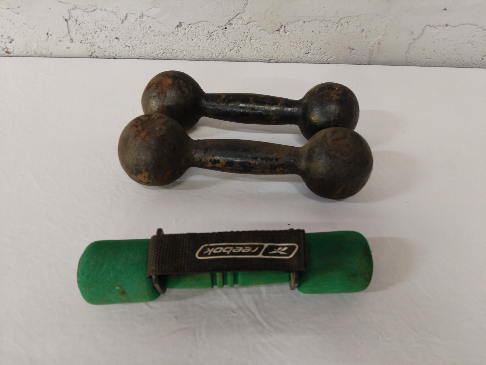 Pair of cast-iron dumbbells — 2 kg each (surface rust, untested)