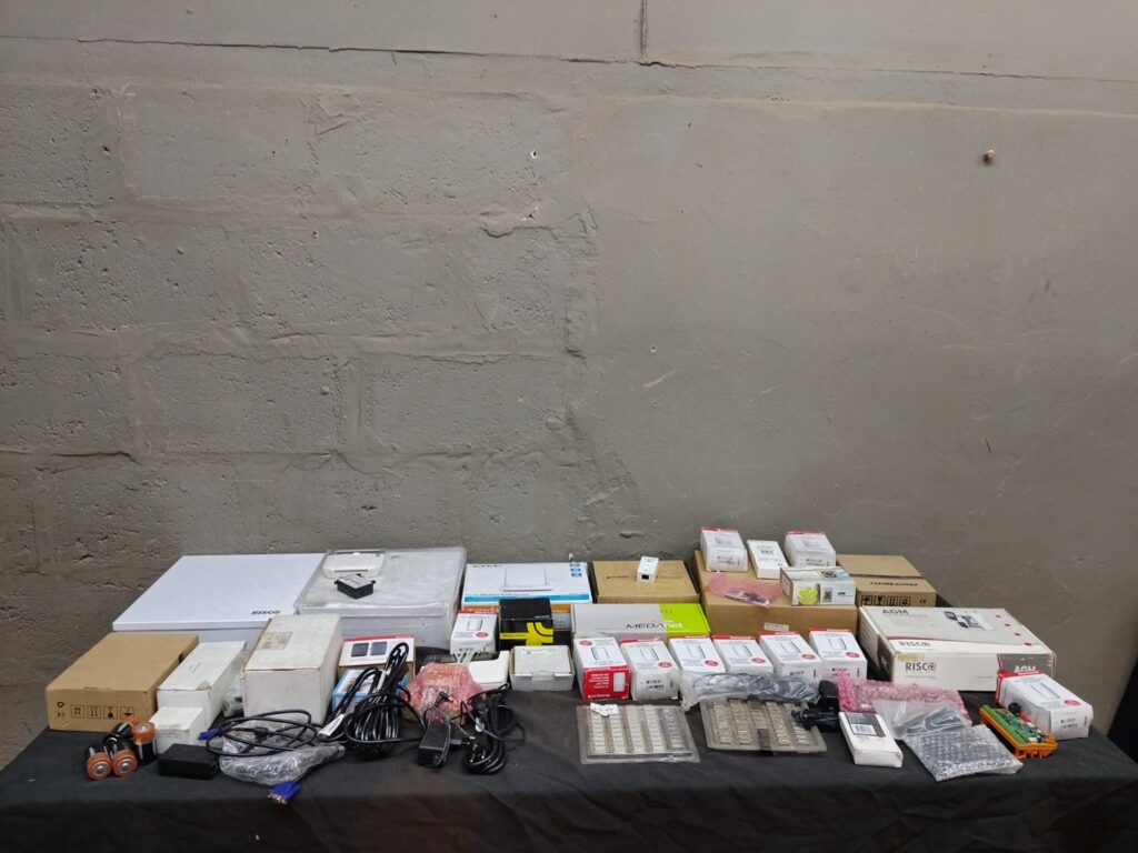 Mixed lot: Security & comms components — Honeywell, RISCO, AGM, Tenda + cables & accessories (approx. 30 pcs)