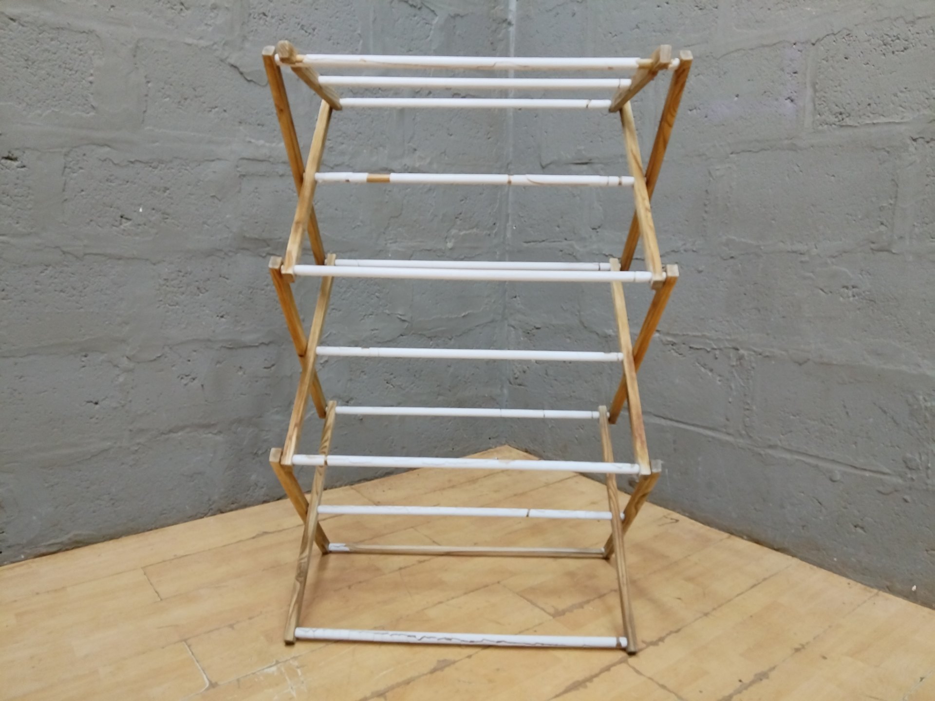 Wooden foldable clothes drying rack / airer — multi-tier, folds & locks, paint-chipped dowels