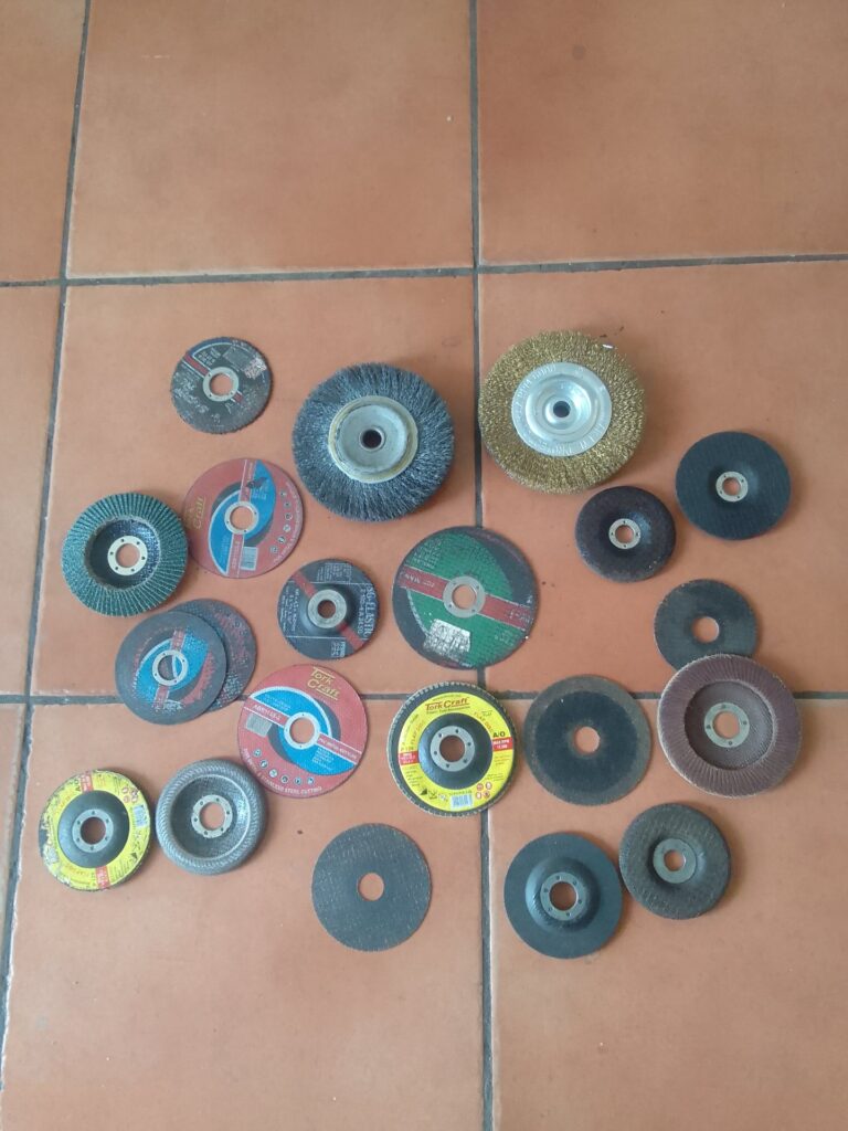 Lot of 20 assorted abrasive discs, flap discs & wire cup/brush wheels (mixed used/new, some defects)