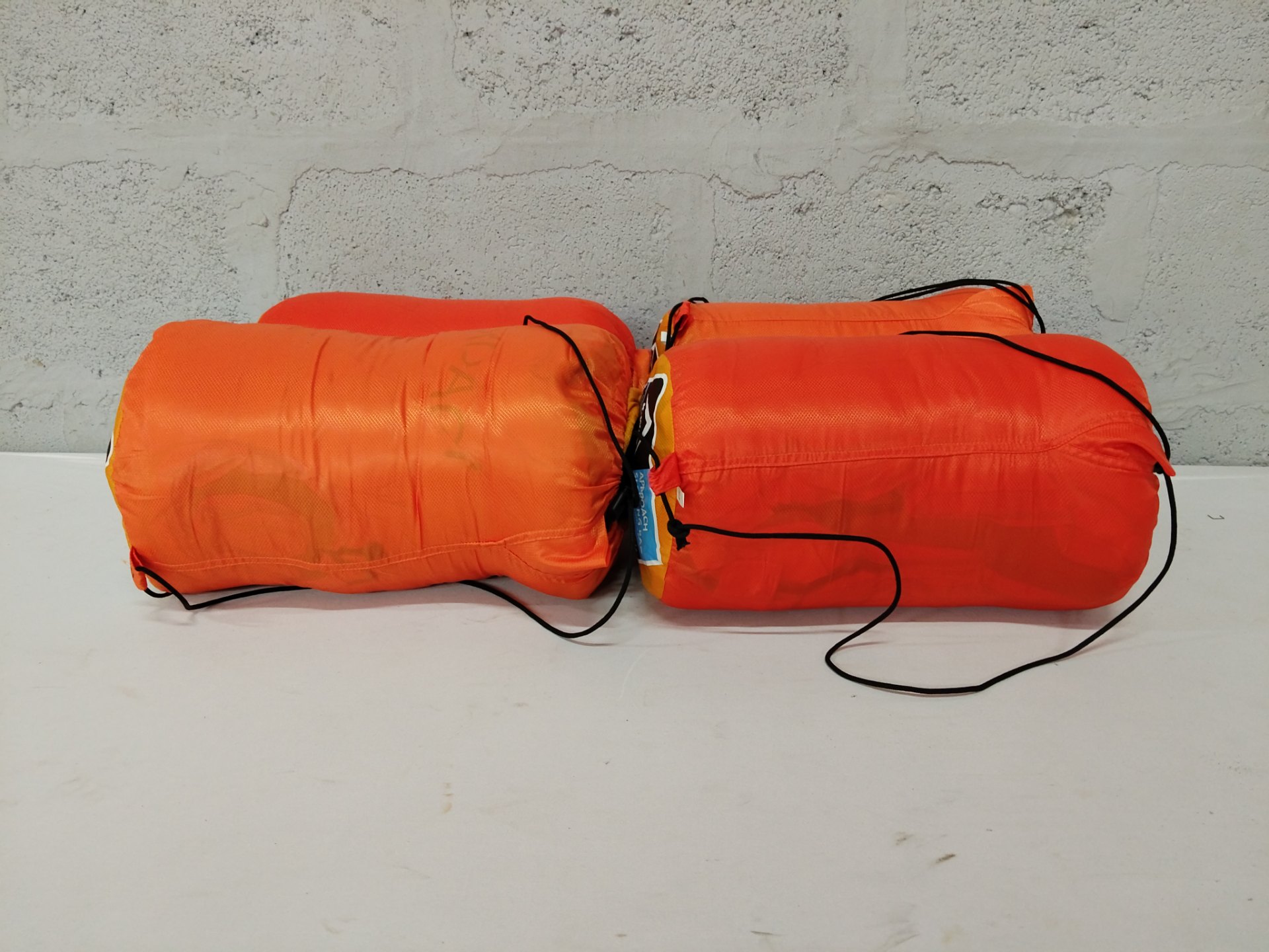 Lot of 4 K-WAY Approach orange sleeping bags (180 x 75cm) — used, in compression sacks