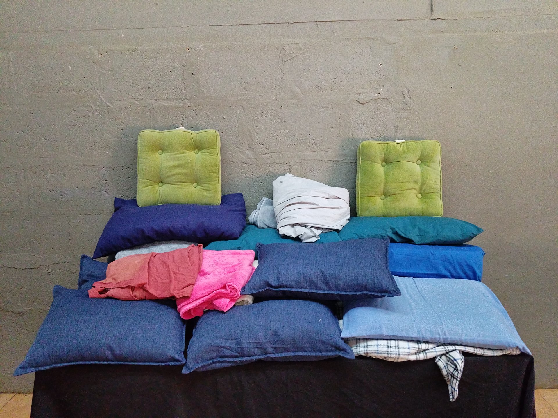 Lot of 16 Assorted Cushions, Covers & Folded Linens — Mixed Colours, Used