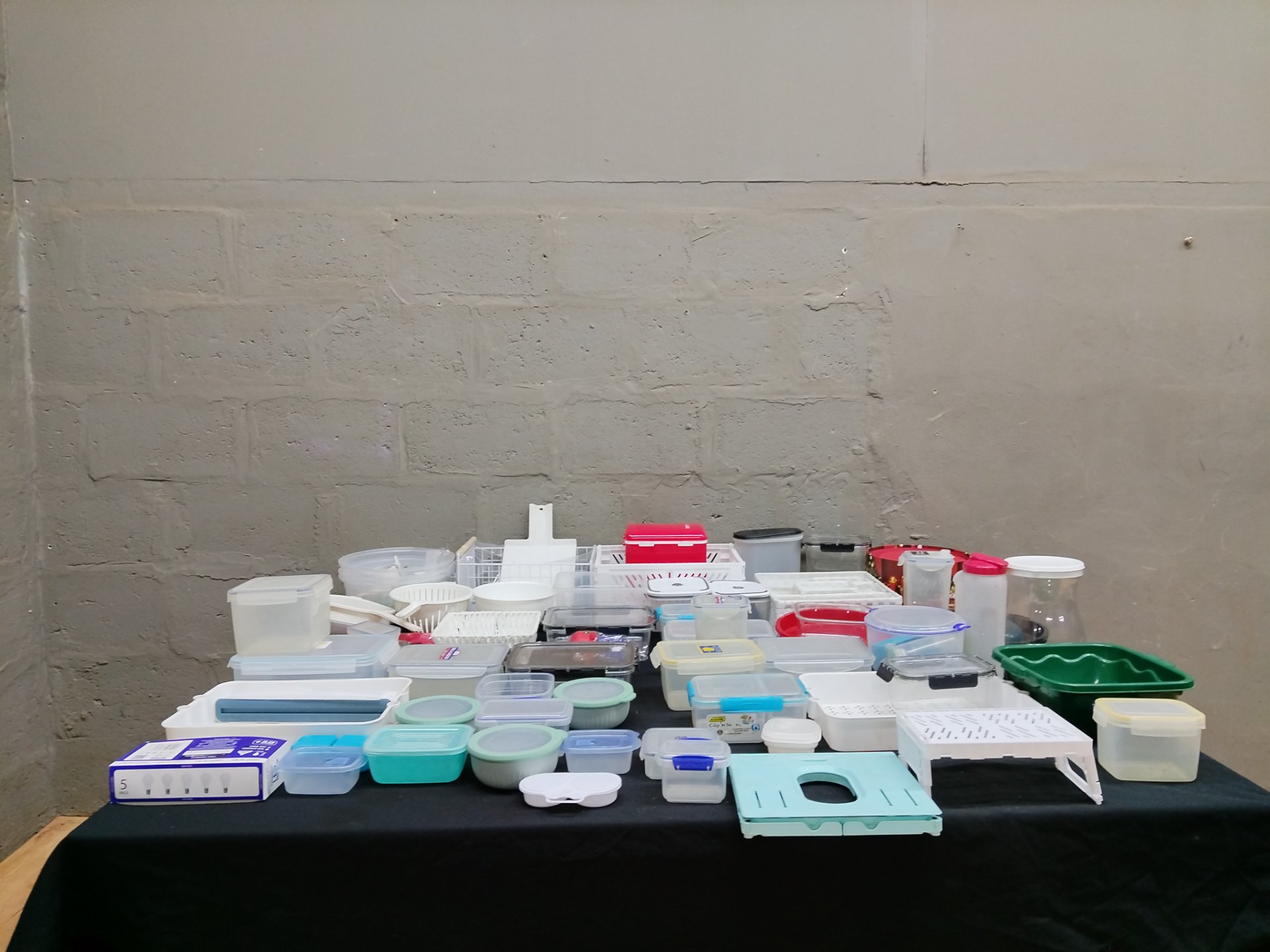 Mixed lot — approx. 30 plastic kitchen containers, bowls, strainers & storage (used, assorted lids)