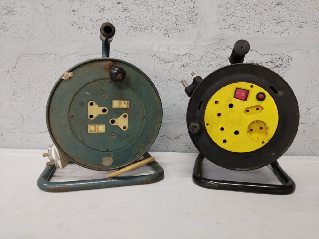Lot of 2 Extension Cable Reels — Metal green reel + Black/Yellow plastic reel (tested working)