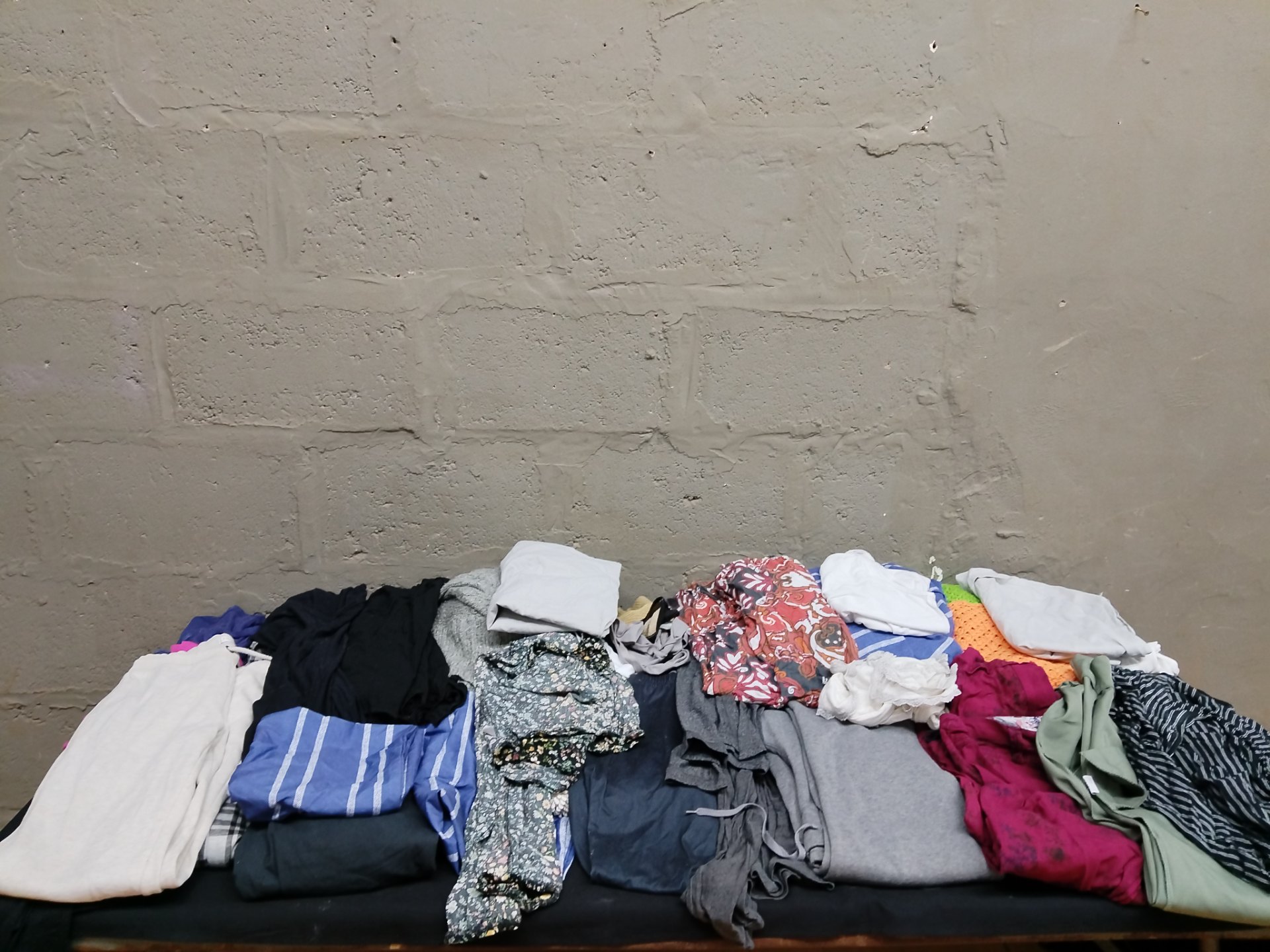 Mixed lot of women’s casual clothing — 15 garments (majority S) with visible brand tags