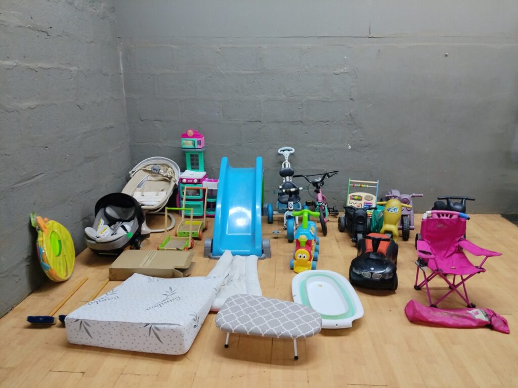 Bulk mixed children’s toys & baby equipment — slide, ride-ons, car seats, bath + accessories (used)