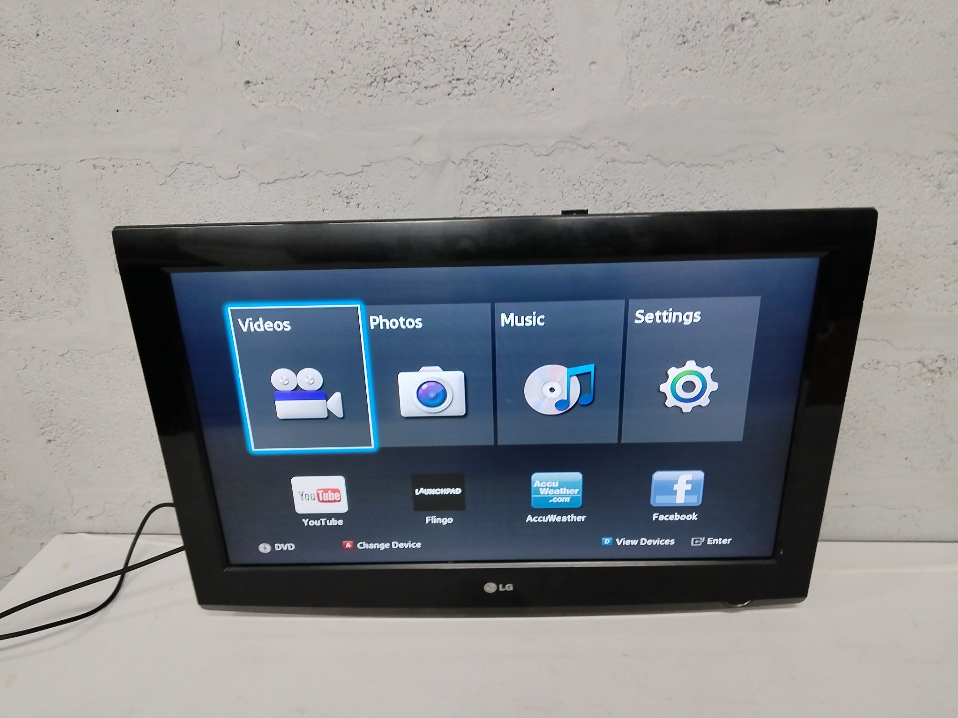 LG TV (80 x 56 cm) — Powers On, Smart menu visible, Power Cable Included, Cosmetic Bezel Wear