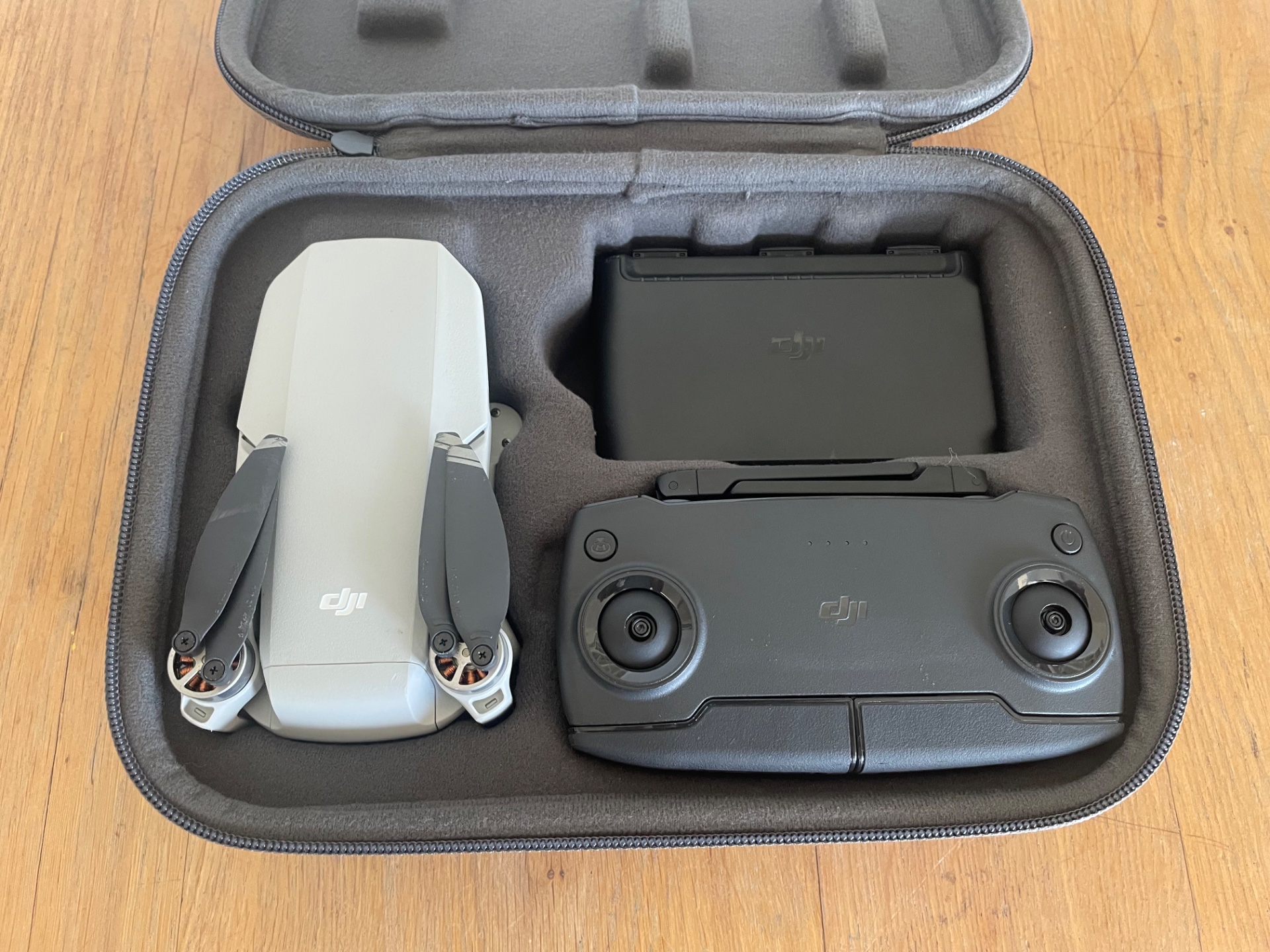 DJI Mavic Mini drone + controller, 3 flight batteries, multi-battery charging hub & case — working (controller battery needs replacement)