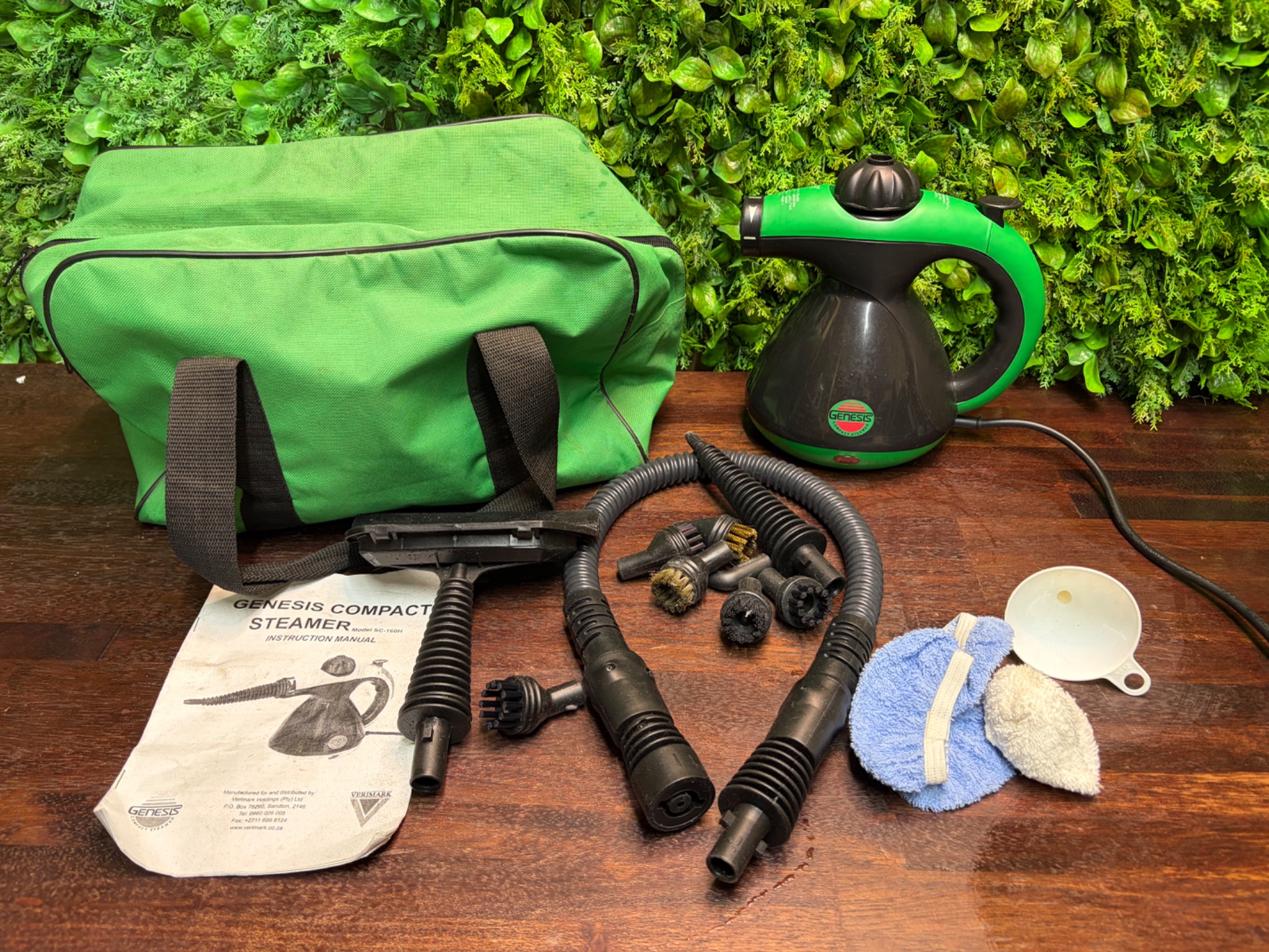 Genesis Compact Handheld Steam Cleaner (green/black) with Hose, Brushes, Manual & Carry Bag — Untested